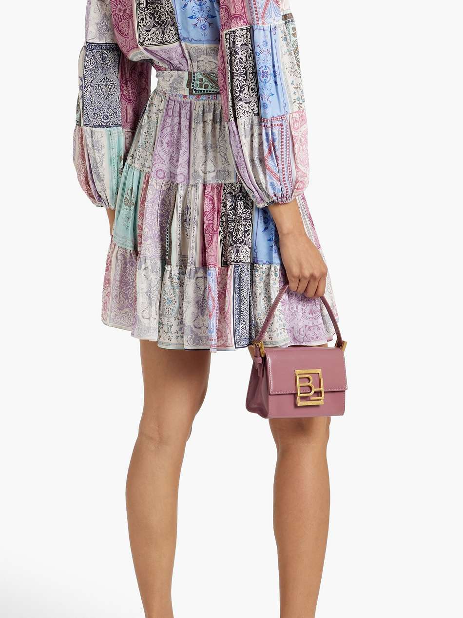 patchwork-effect printed crepe mini wrap dress