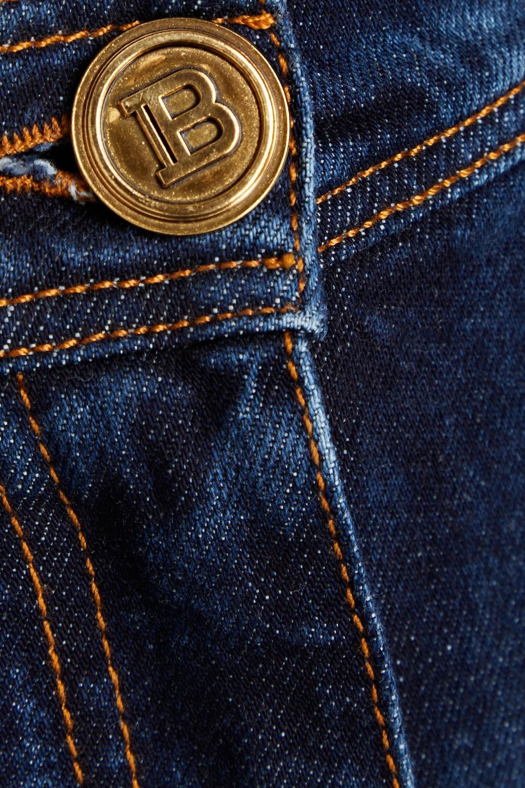 BALMAIN بنطلون جينز سكيني بلون باهت وخصر مرتفع