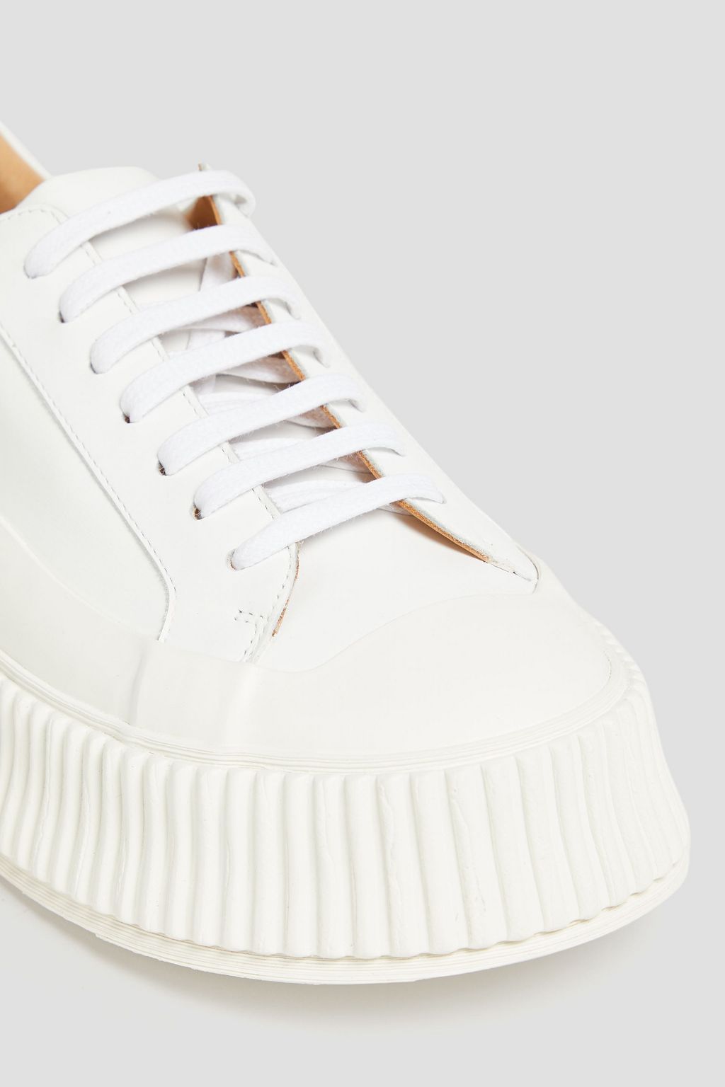 JIL SANDER Leather and rubber platform sneakers