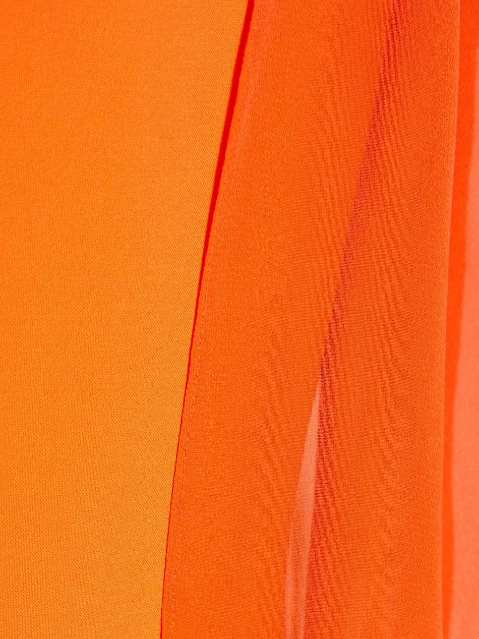 cape-effect chiffon and crepe gown