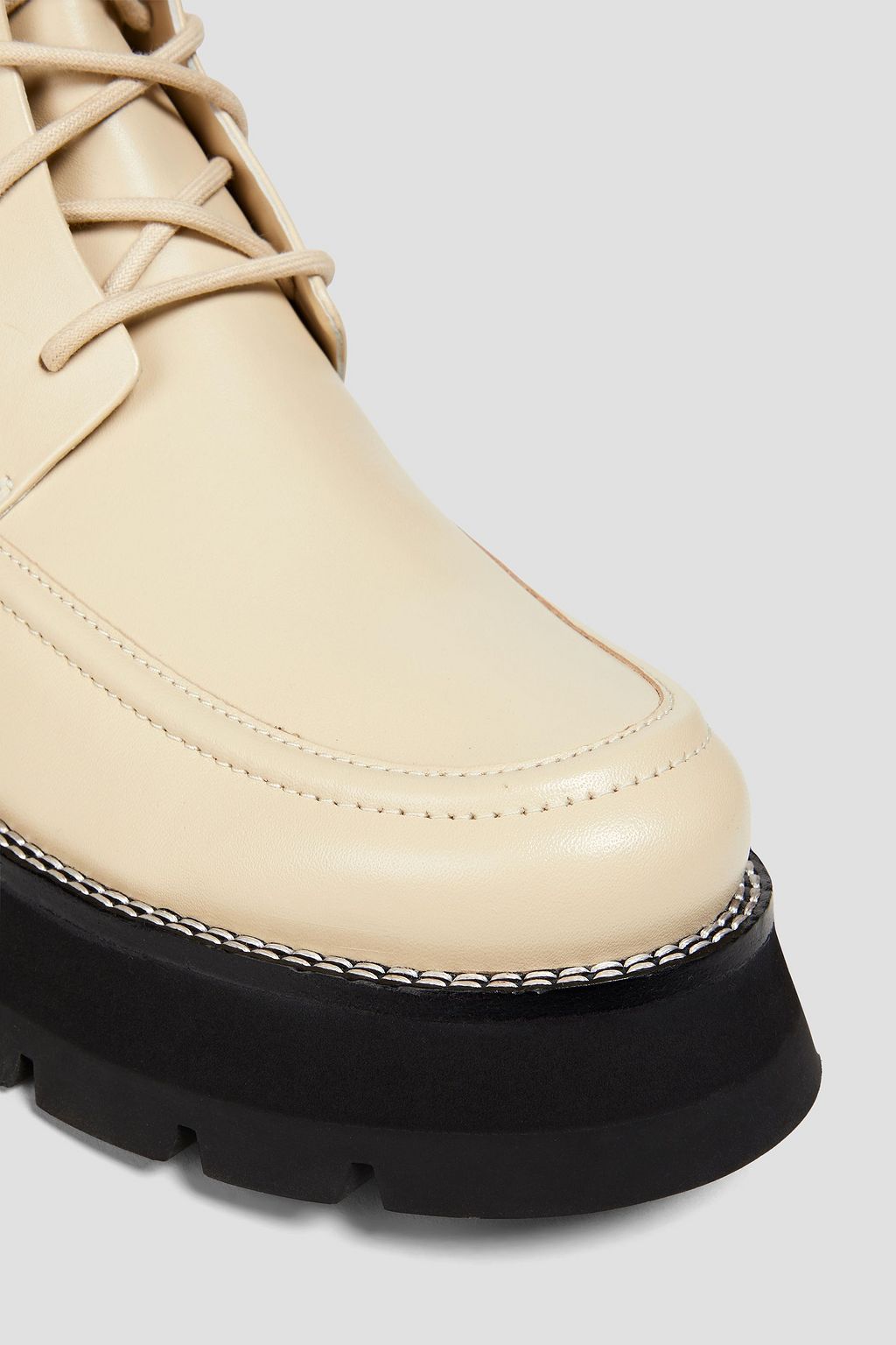 3.1 PHILLIP LIM بوت كومبات من الجلد
