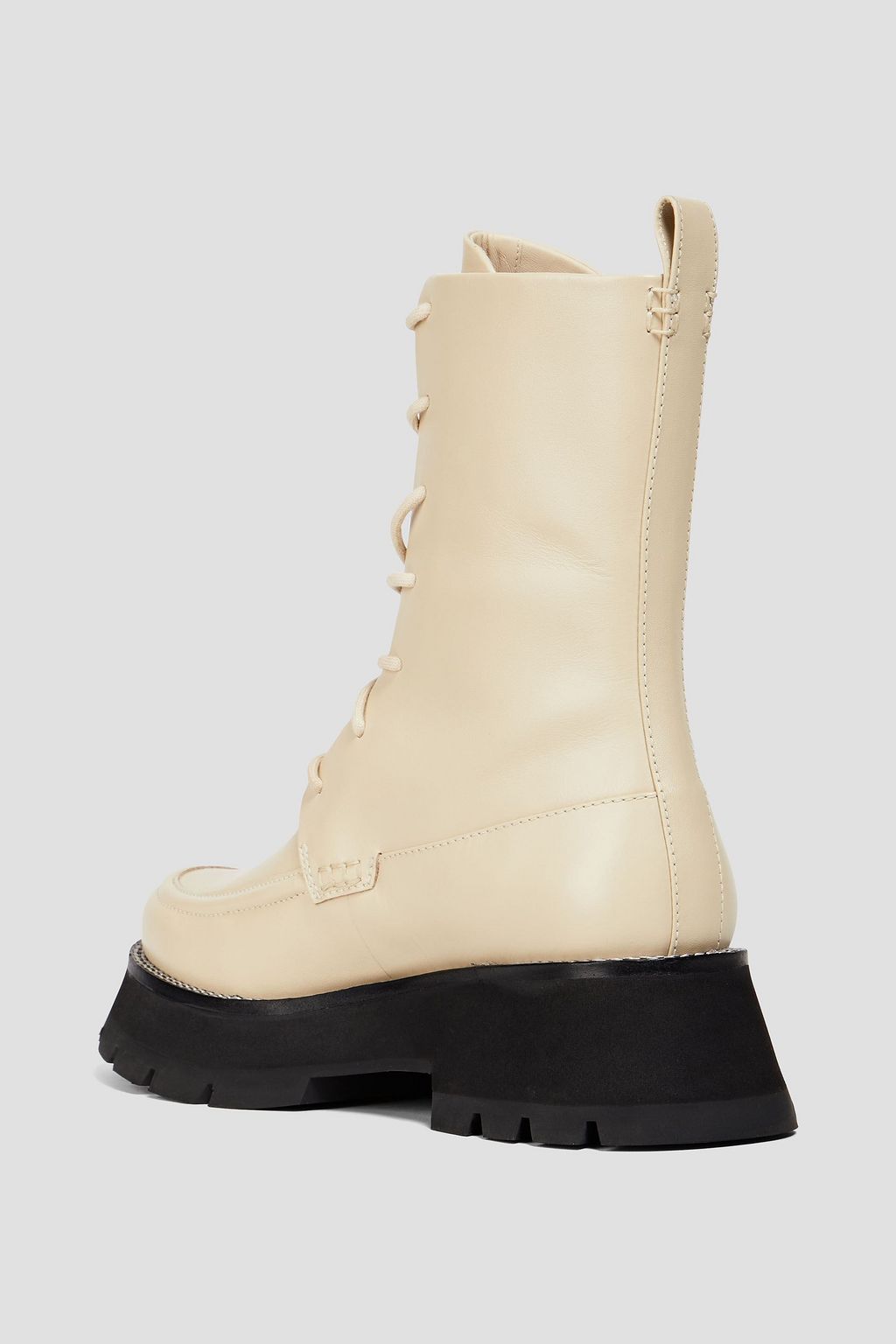 3.1 PHILLIP LIM بوت كومبات من الجلد