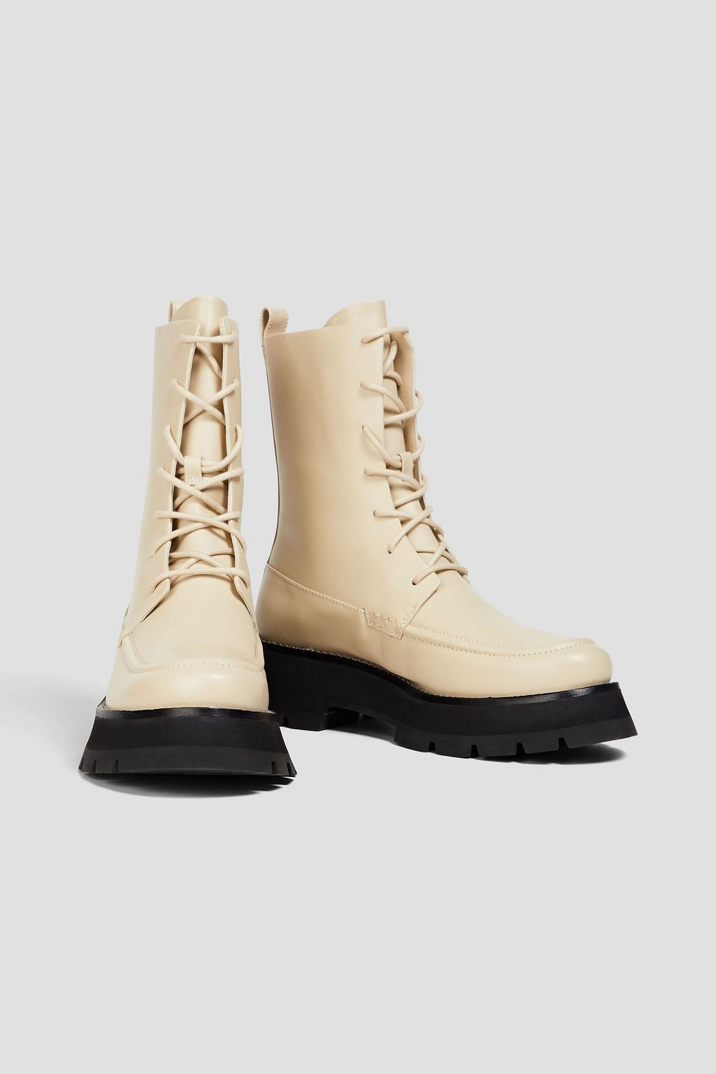 3.1 PHILLIP LIM بوت كومبات من الجلد