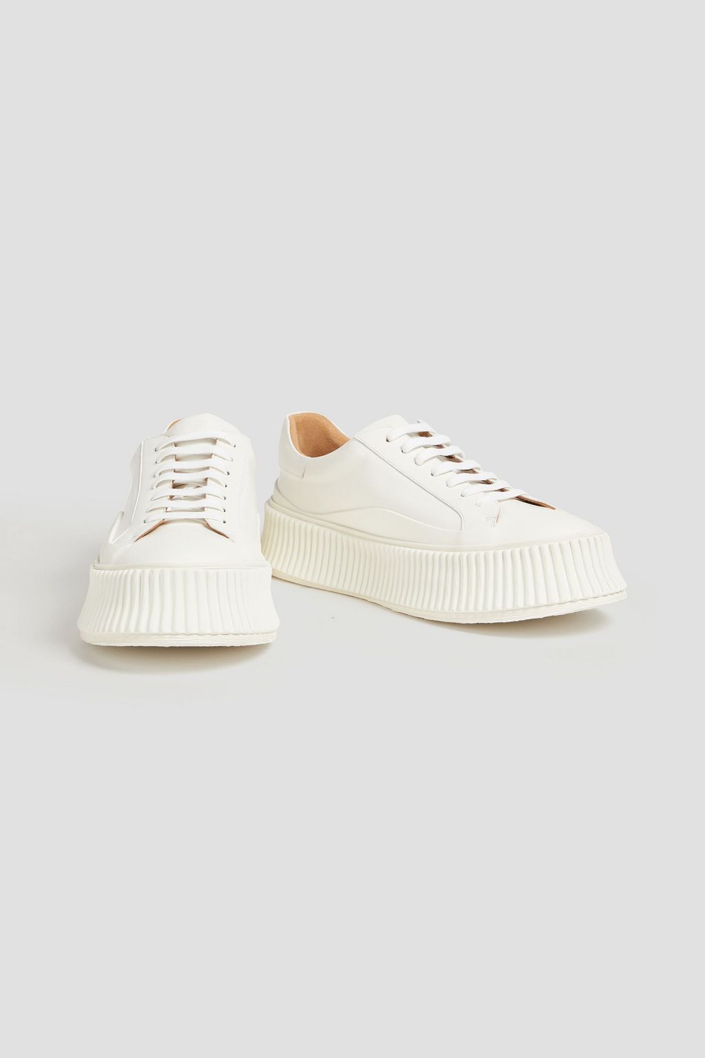 JIL SANDER حذاء سنيكرز بنعل سميك مصنوع من الجلد