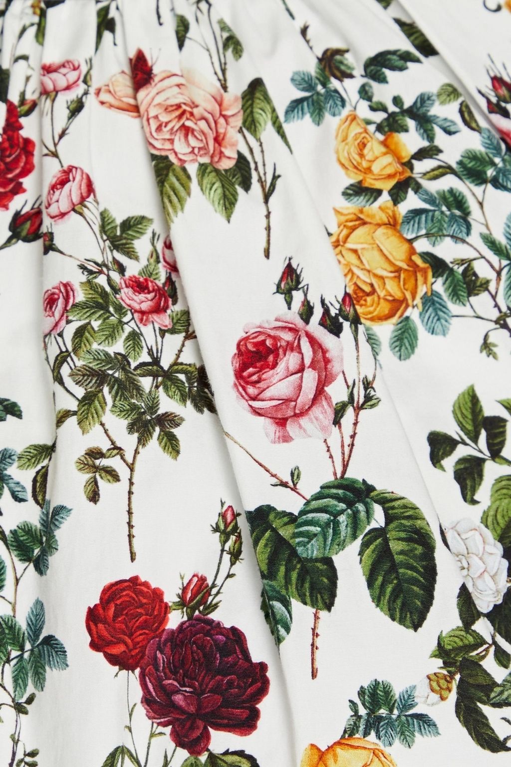 OSCAR DE LA RENTA بلوزة من مزيج من القطن وقطن البوبلين مزينة بطبعة الأزهار وبفتحات