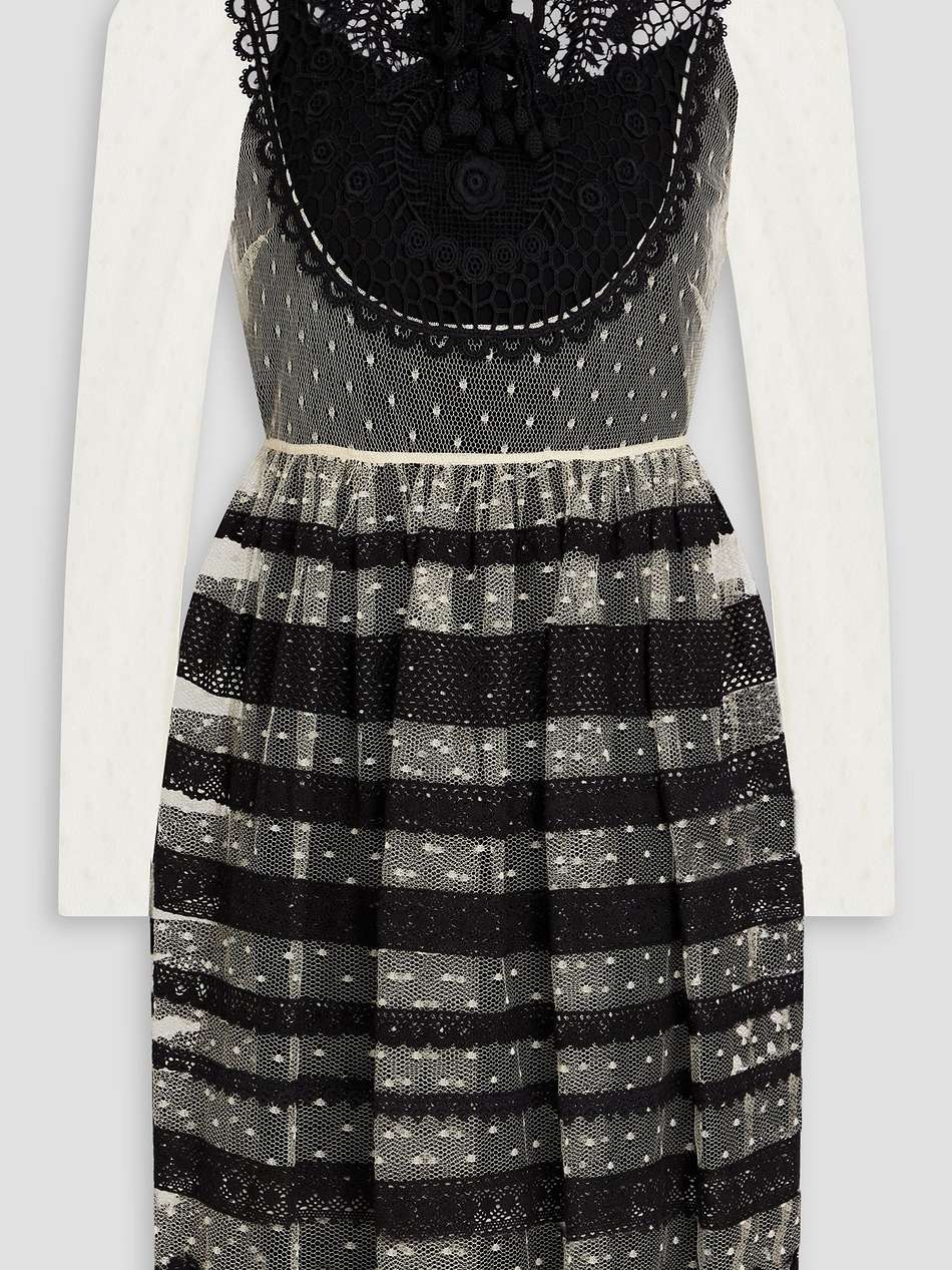 crocheted lace-paneled point d'esprit mini dress