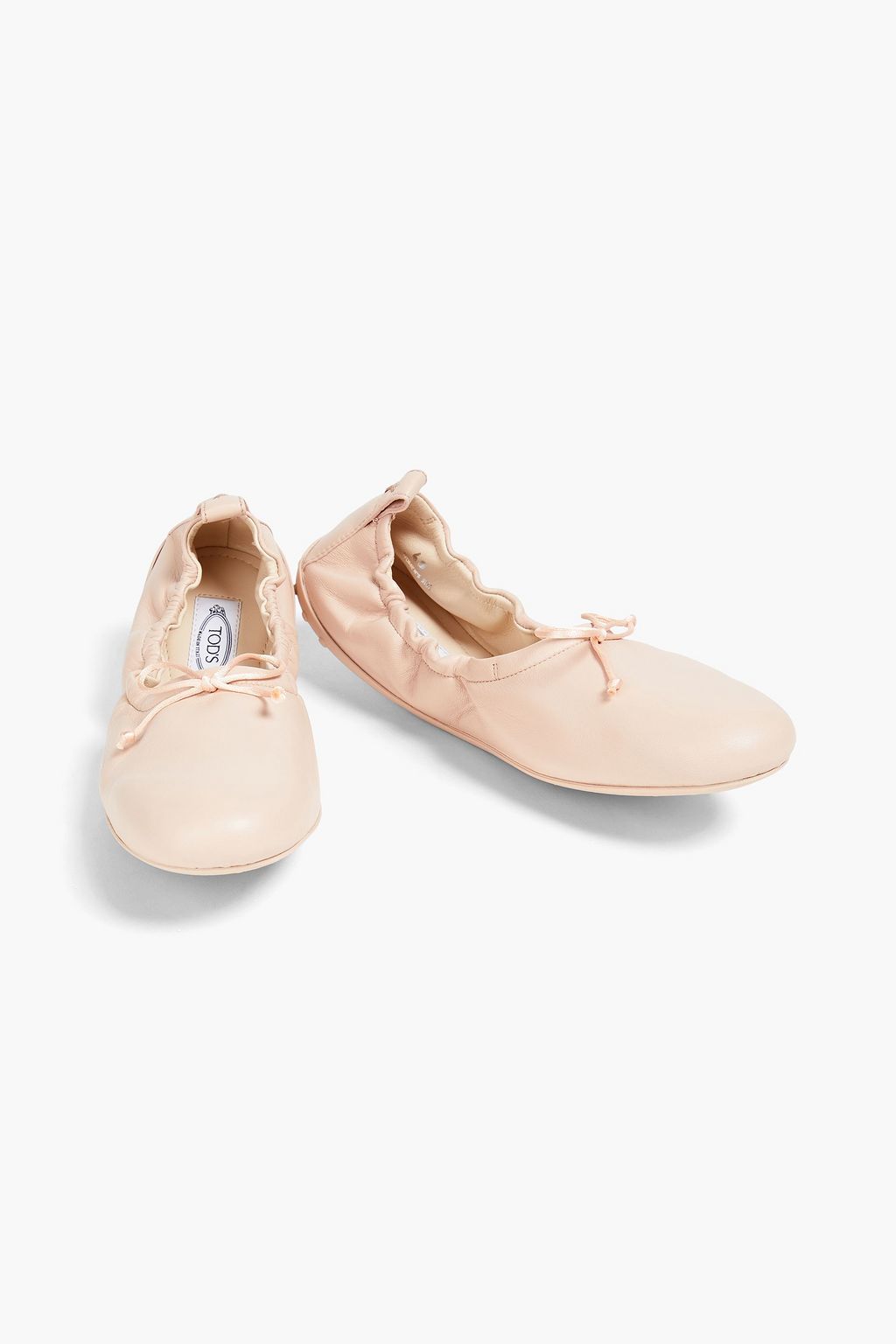 TOD'S حذاء باليرينا مسطح مصنوع من الجلد ومزين بربطة على شكل فراشة