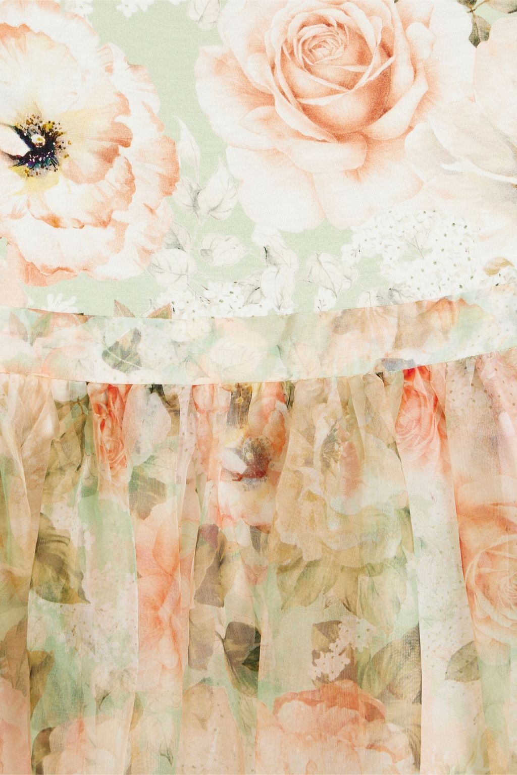 ALICE + OLIVIA فستان قصير «تشارا» مصنوع من الجيرسي وحرير الأورغنزا بحواف واسعة ومزين بطبعة الأزهار