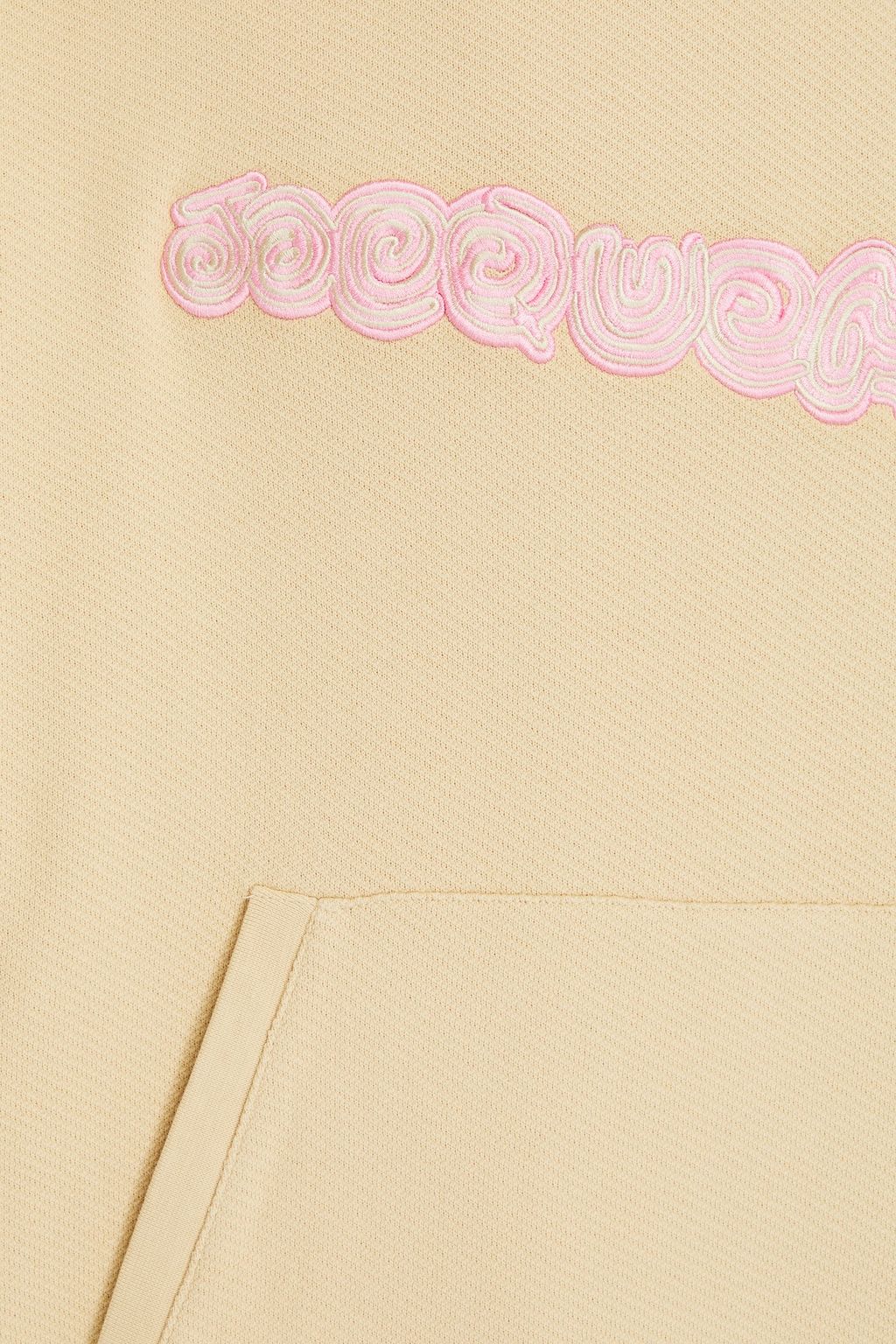 JACQUEMUS كنزة هودي ’’سبيرال’’ مصنوعة من قطن تيري فرنسي مطاطي بتصميم مطرّز