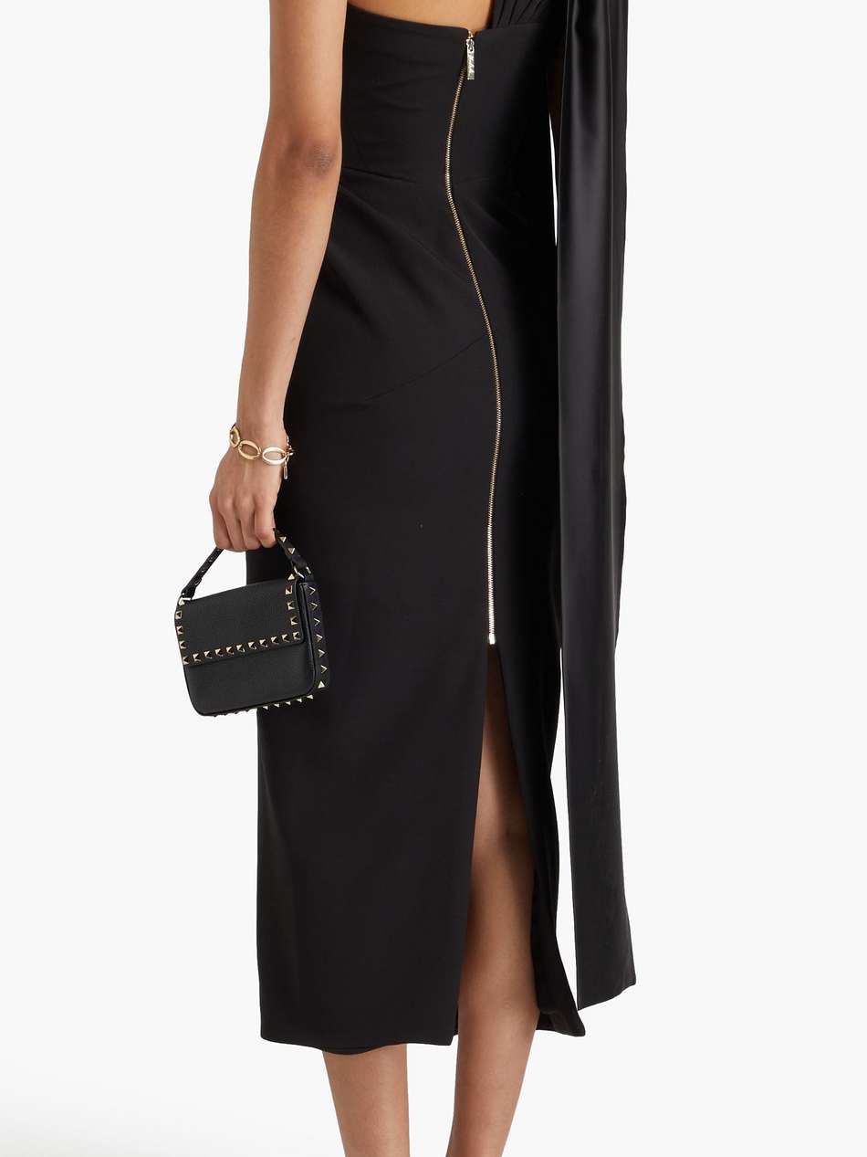 one-shoulder pleated crepe gown