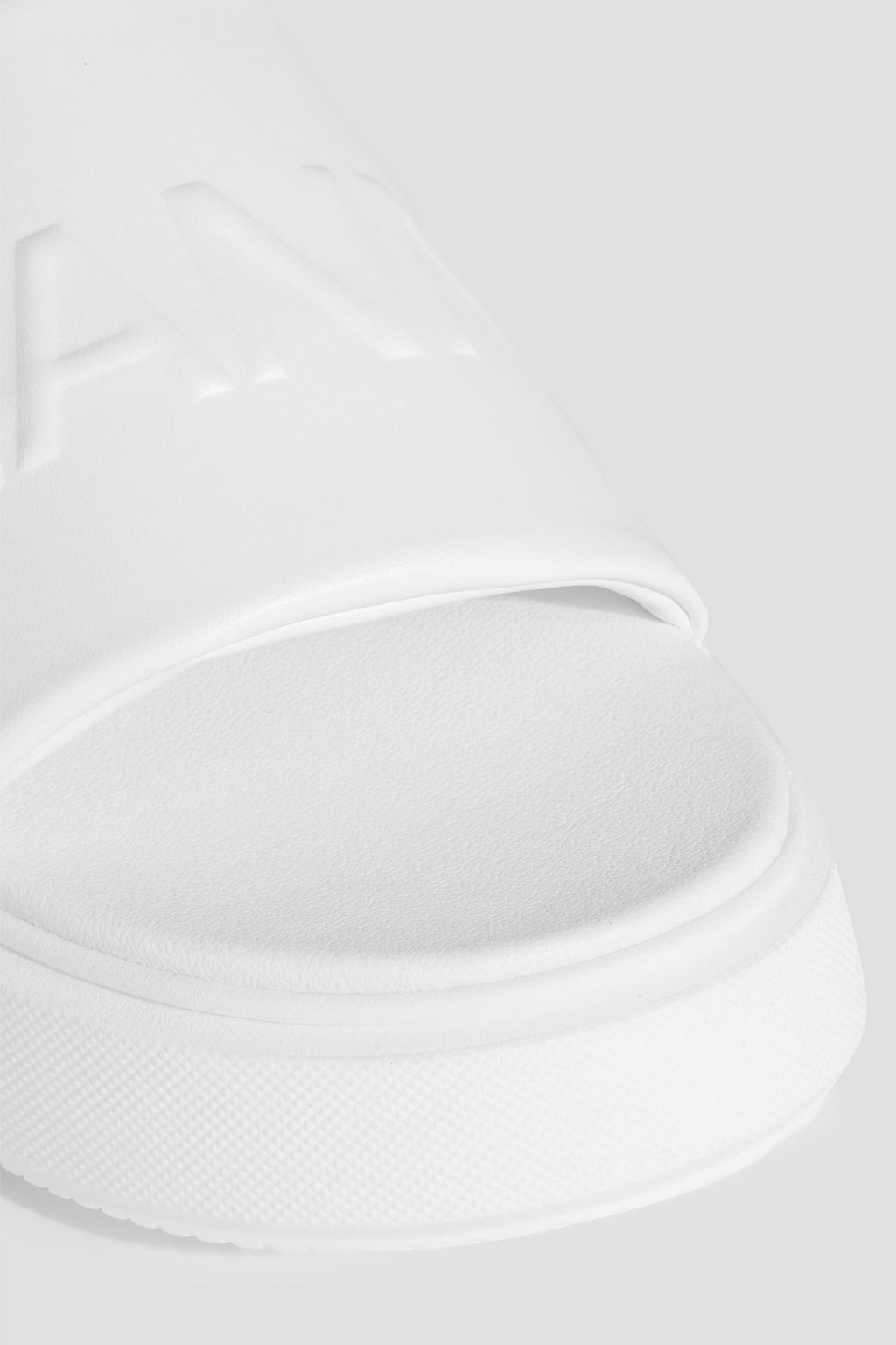 GANNI Logo-embossed faux leather platform slides