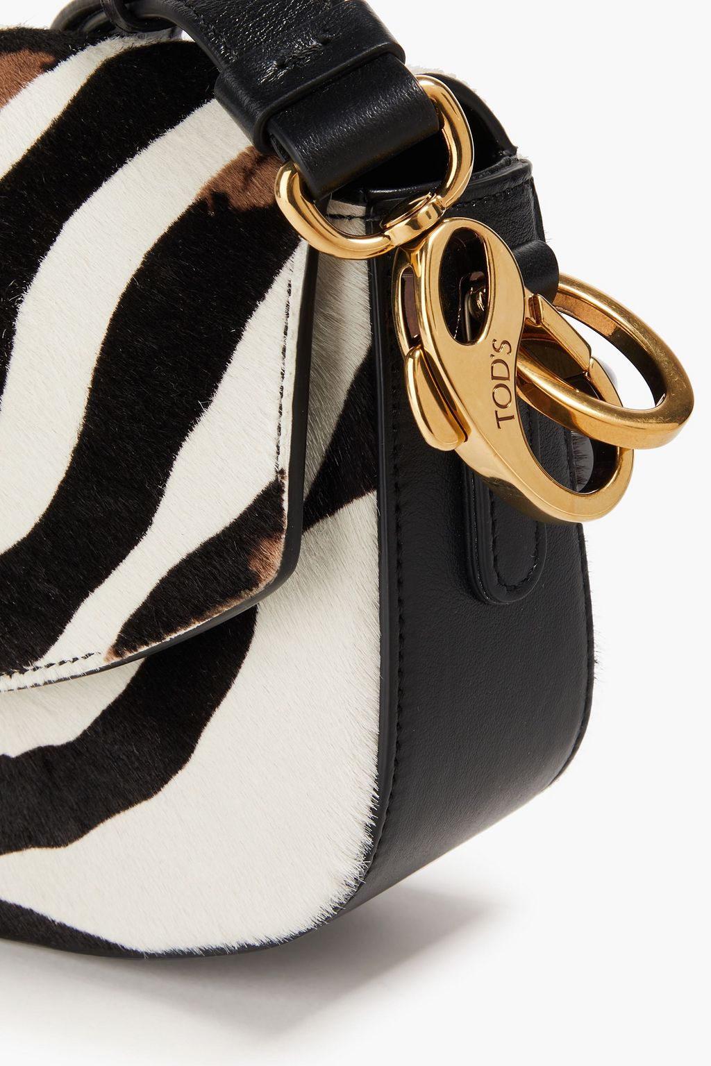 TOD'S حقيبة كروس بودي من وبر العجل بطبعة جلد الحمار الوحشي