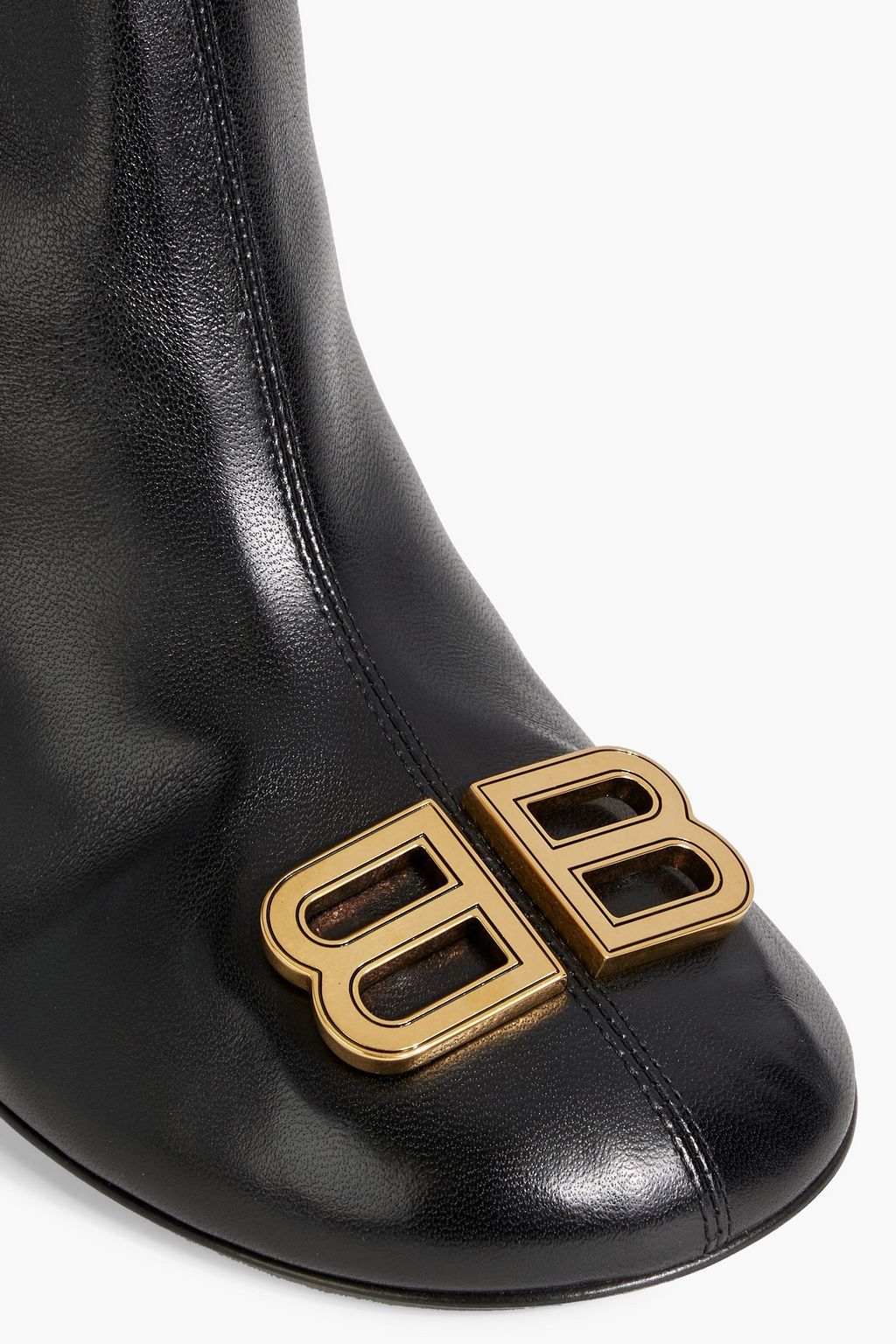 BALENCIAGA بوت بطول الكاحل “جروبي” مصنوع من الجلد