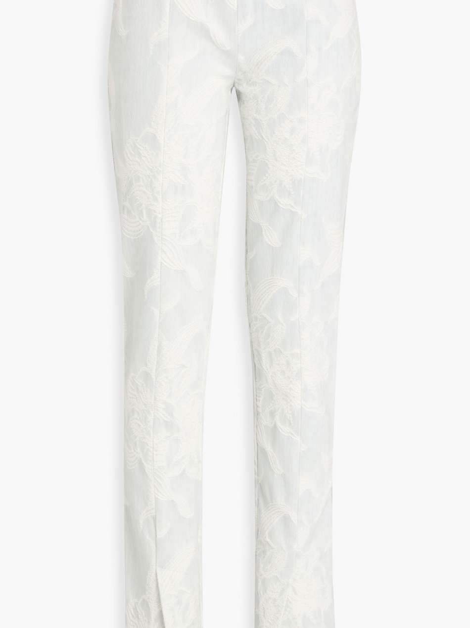 embroidered mid-rise tapered jeans