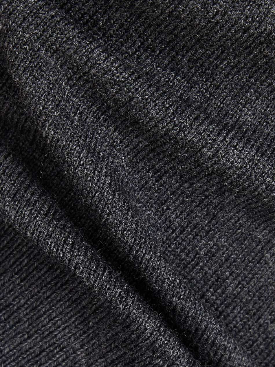 ribbed wool-blend turtleneck top