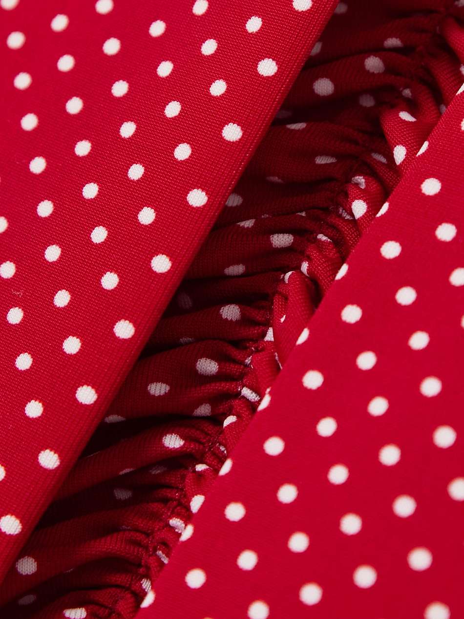 strapless bow-detailed cutout polka-dot stretch-jersey mini dress