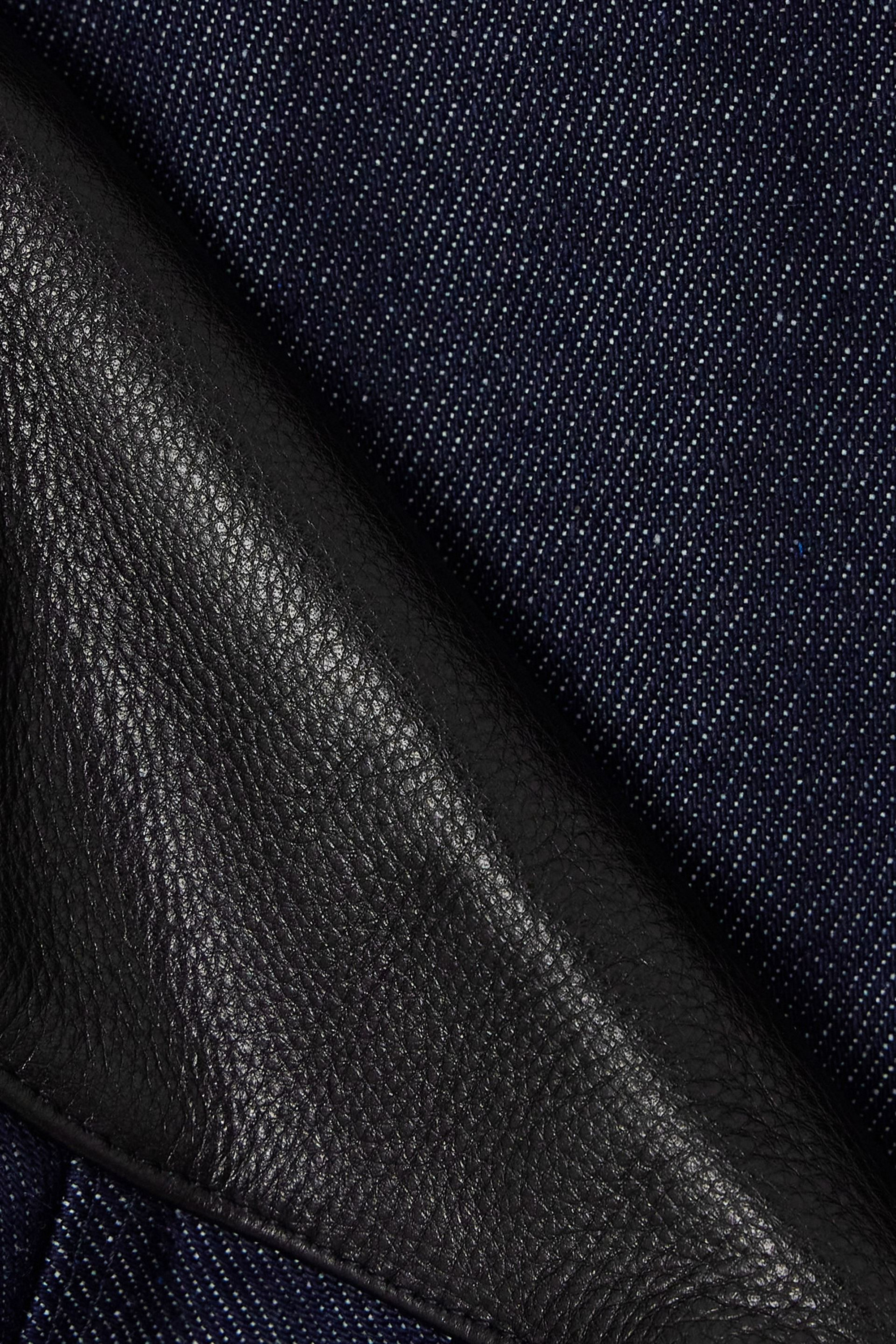 Coperni Cropped leather and jersey-trimmed mid-rise tapered jeans thumbnail