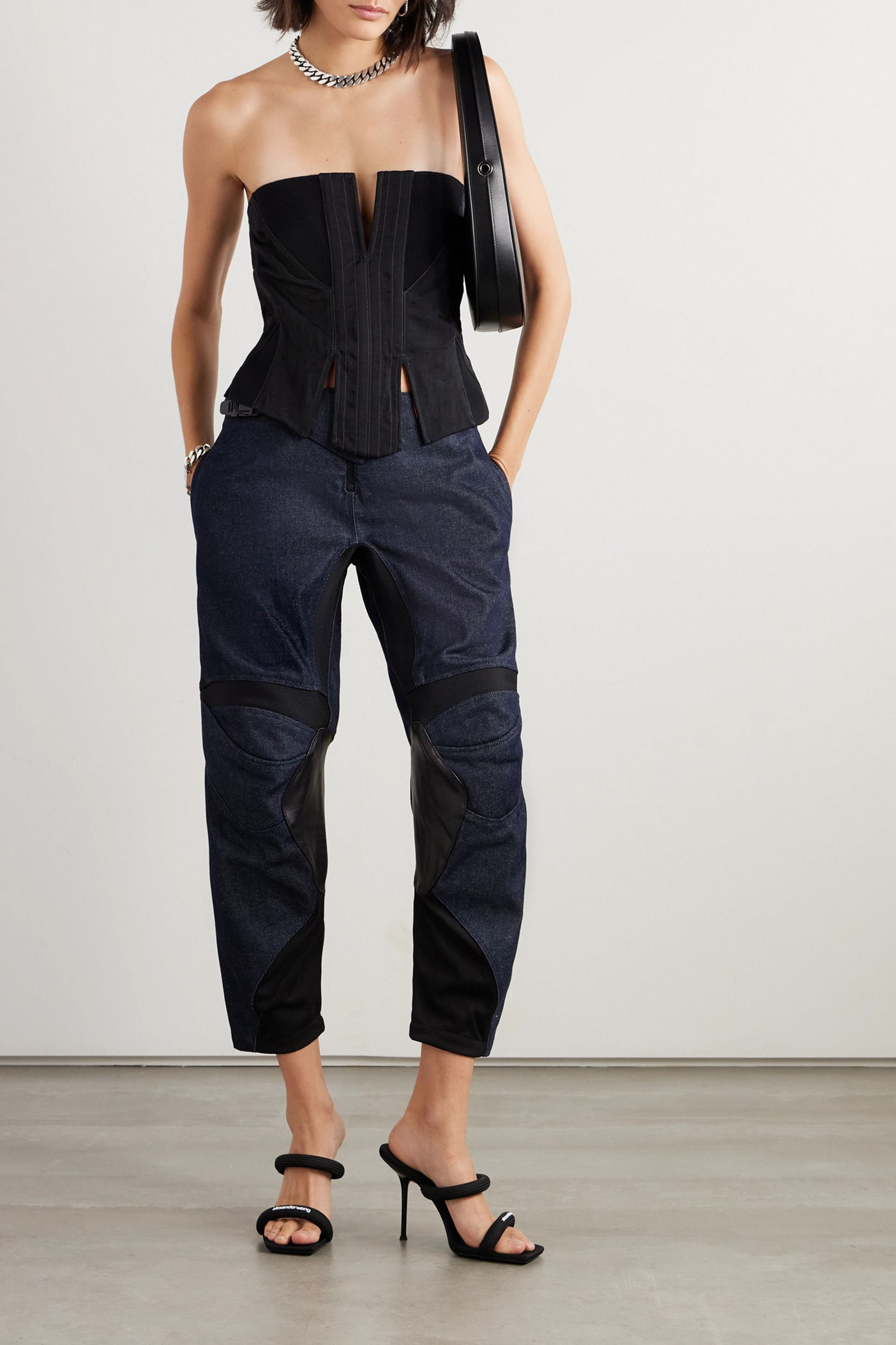 Coperni Cropped leather and jersey-trimmed mid-rise tapered jeans