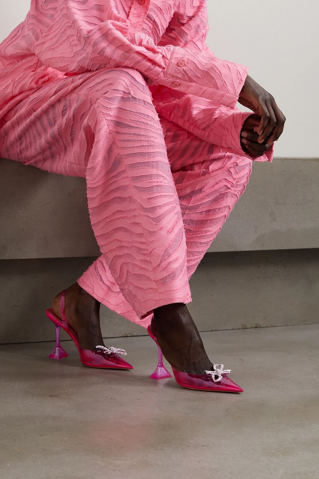 AMINA MUADDI Rosie crystal-embellished bow-detailed PVC slingback pumps