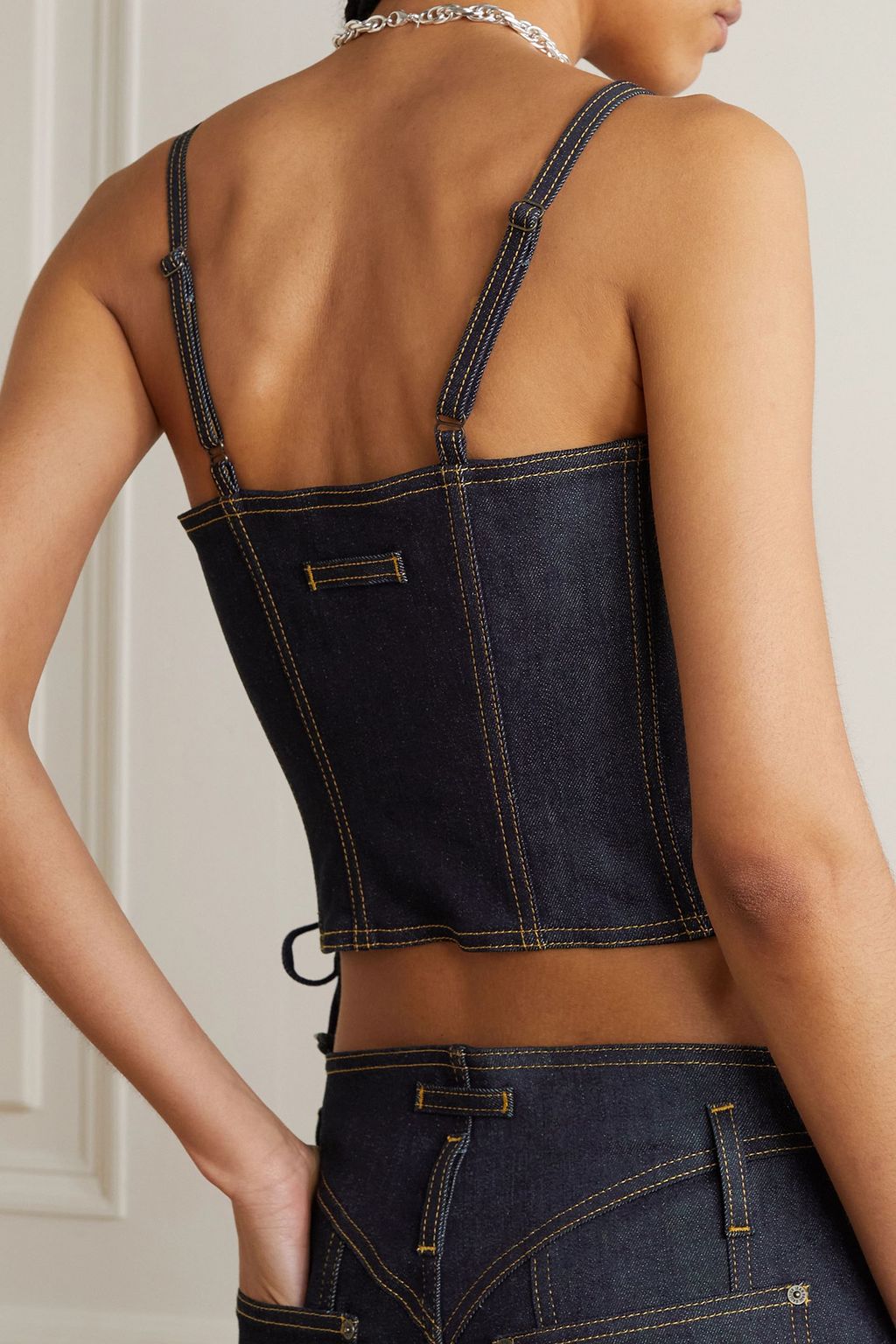 JEAN PAUL GAULTIER Lace-up topstitched denim bustier top