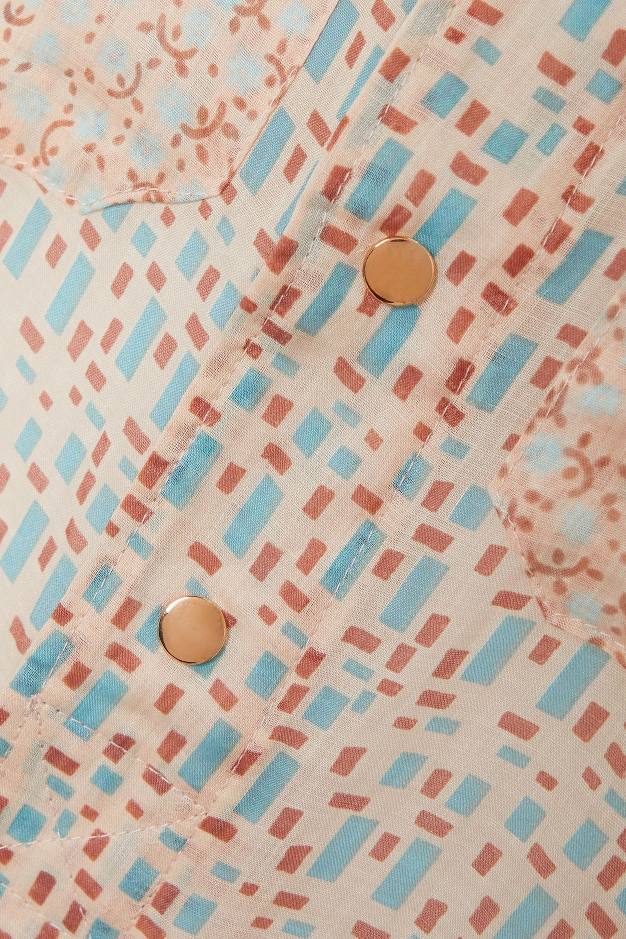 Yvonne S Printed cotton-voile jumpsuit