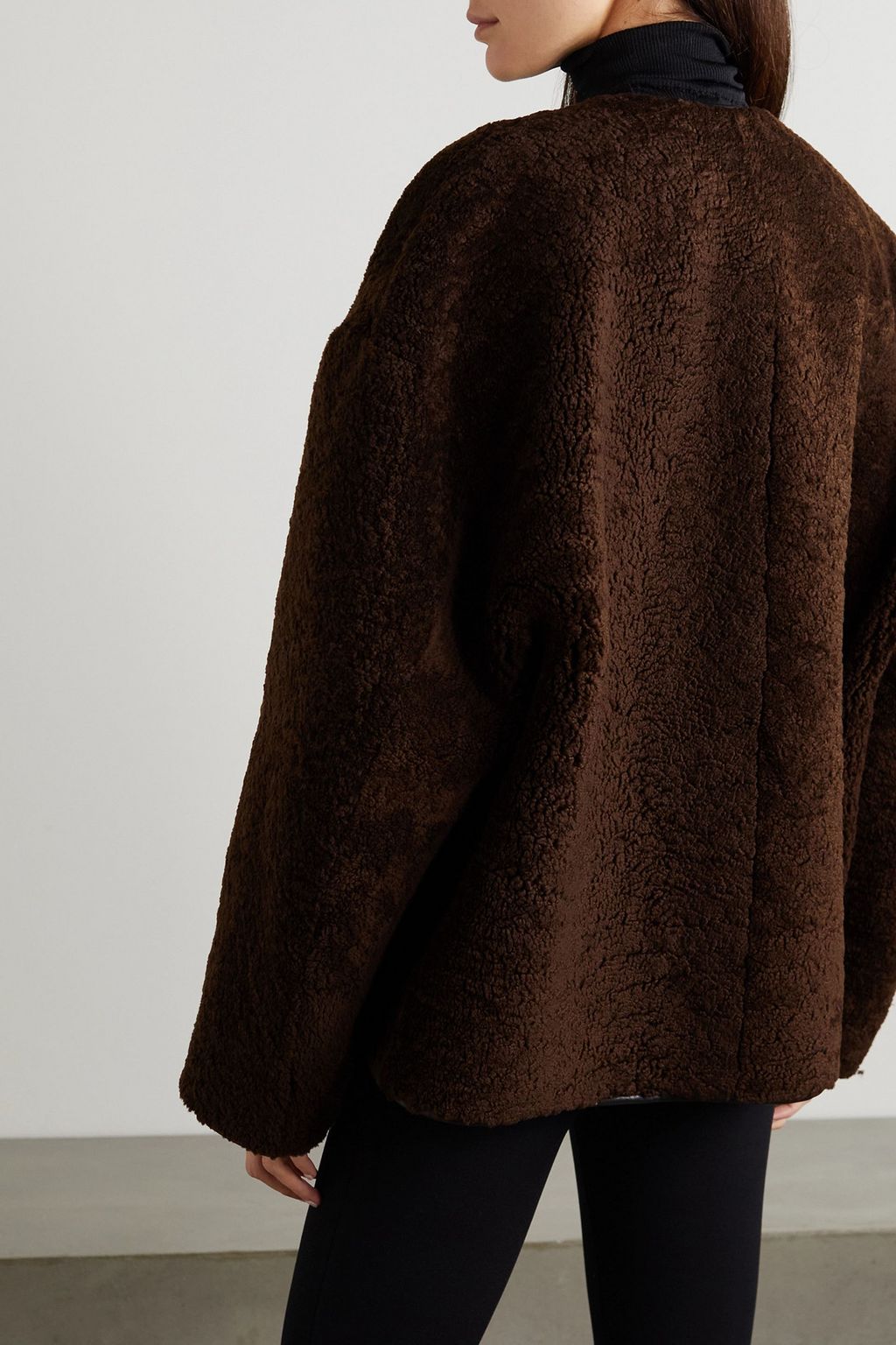 TOTEME Leather-trimmed shearling jacket