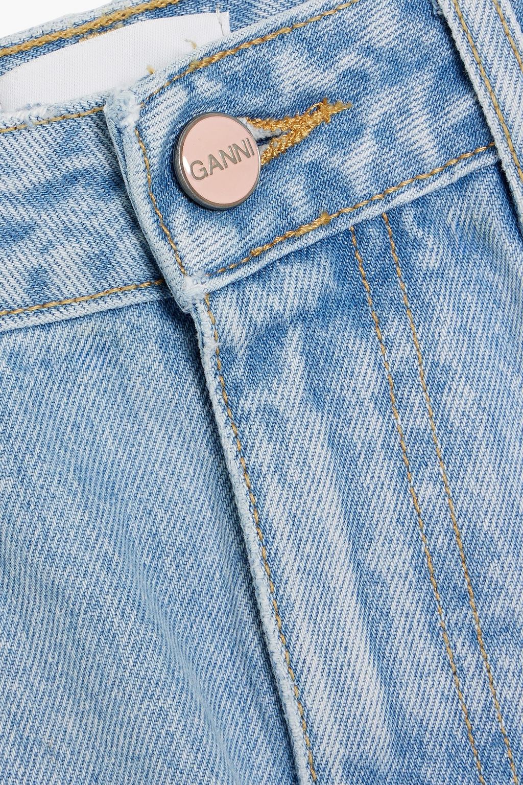 GANNI Faded cropped high-rise tapered jeans