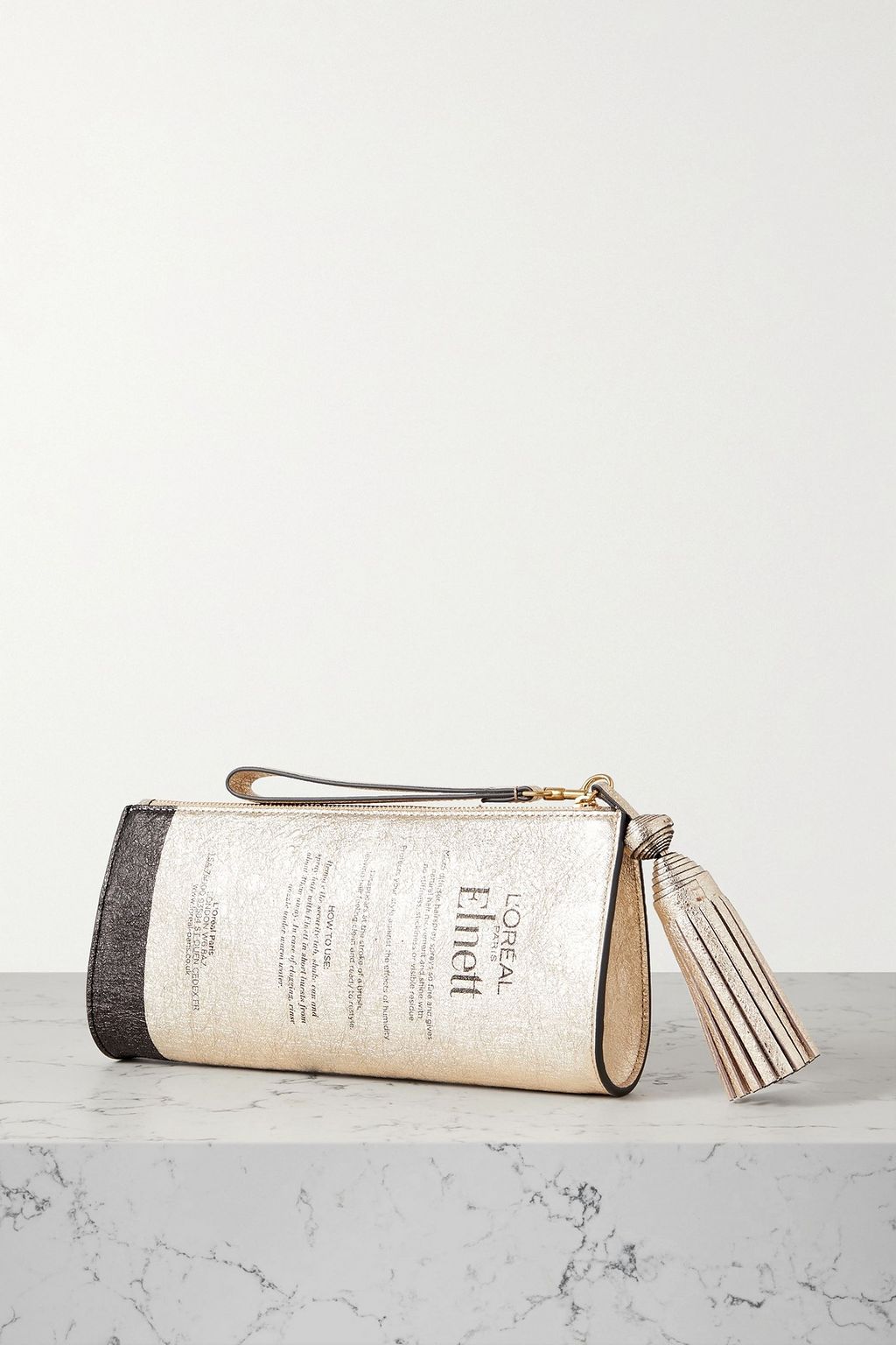 ANYA HINDMARCH Elnett tasseled printed metallic crinkled-leather clutch