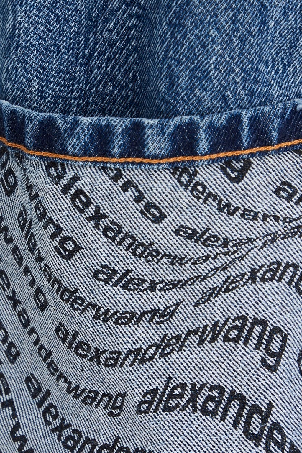 ALEXANDER WANG جاكيت مصنوع من الدينم ومزين بطبعات