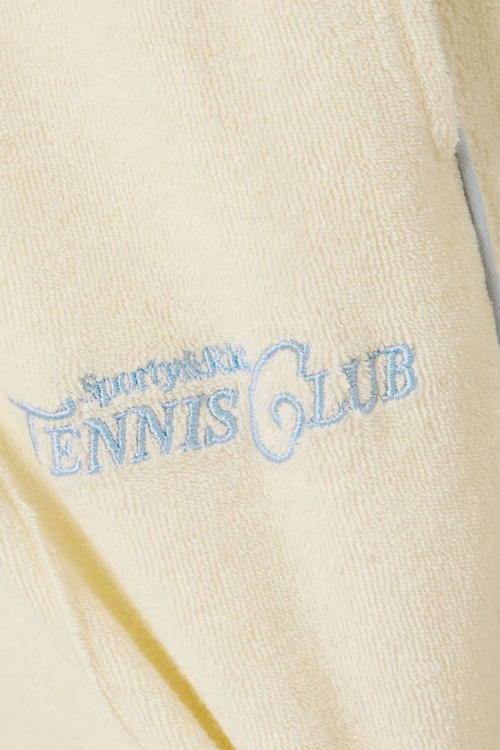 SPORTY & RICH بنطال رياضي Rizzoli Tennis من قطن تيري مطرّز