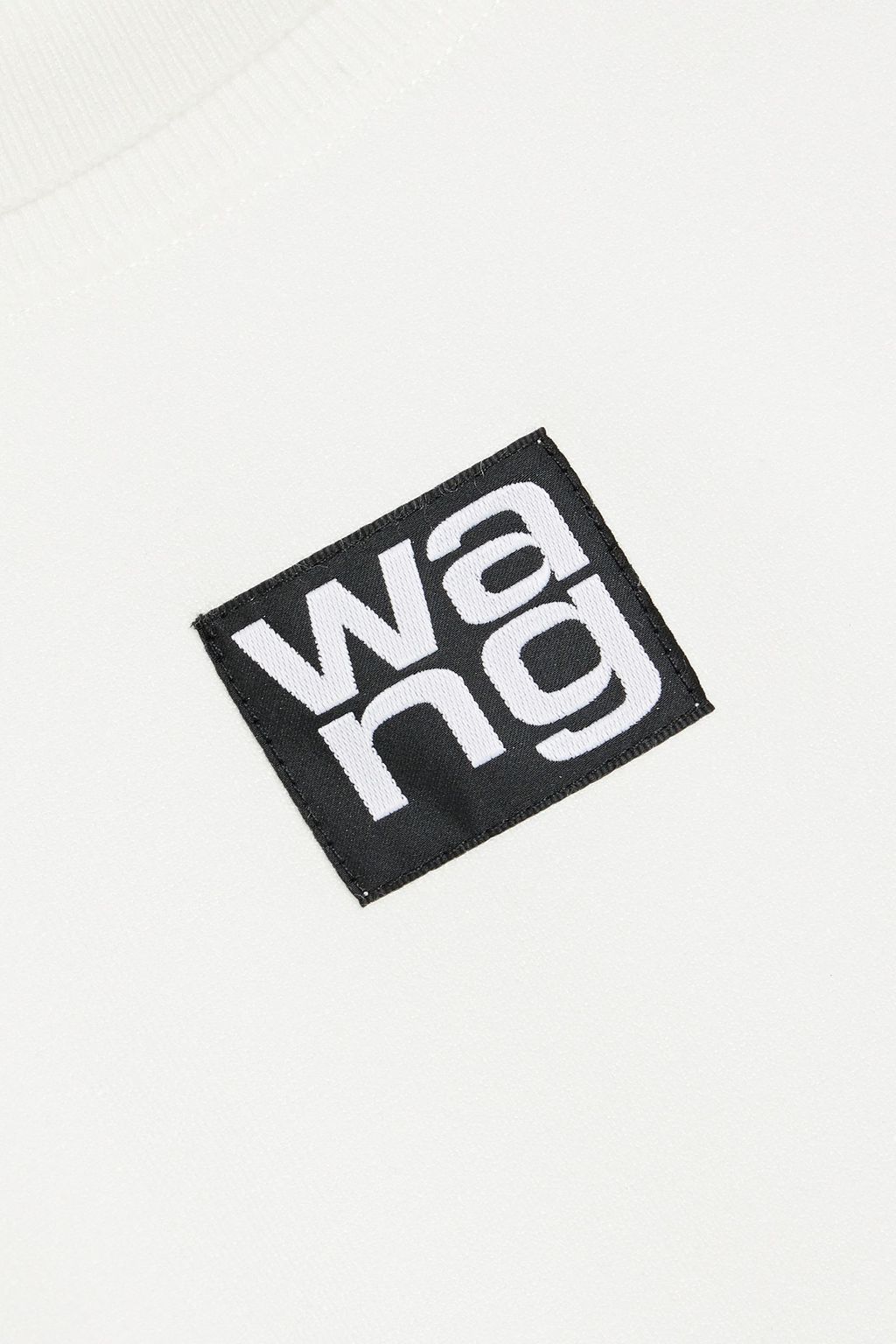 ALEXANDERWANG.T توب قصير بياقة عالية من نسيج محاك