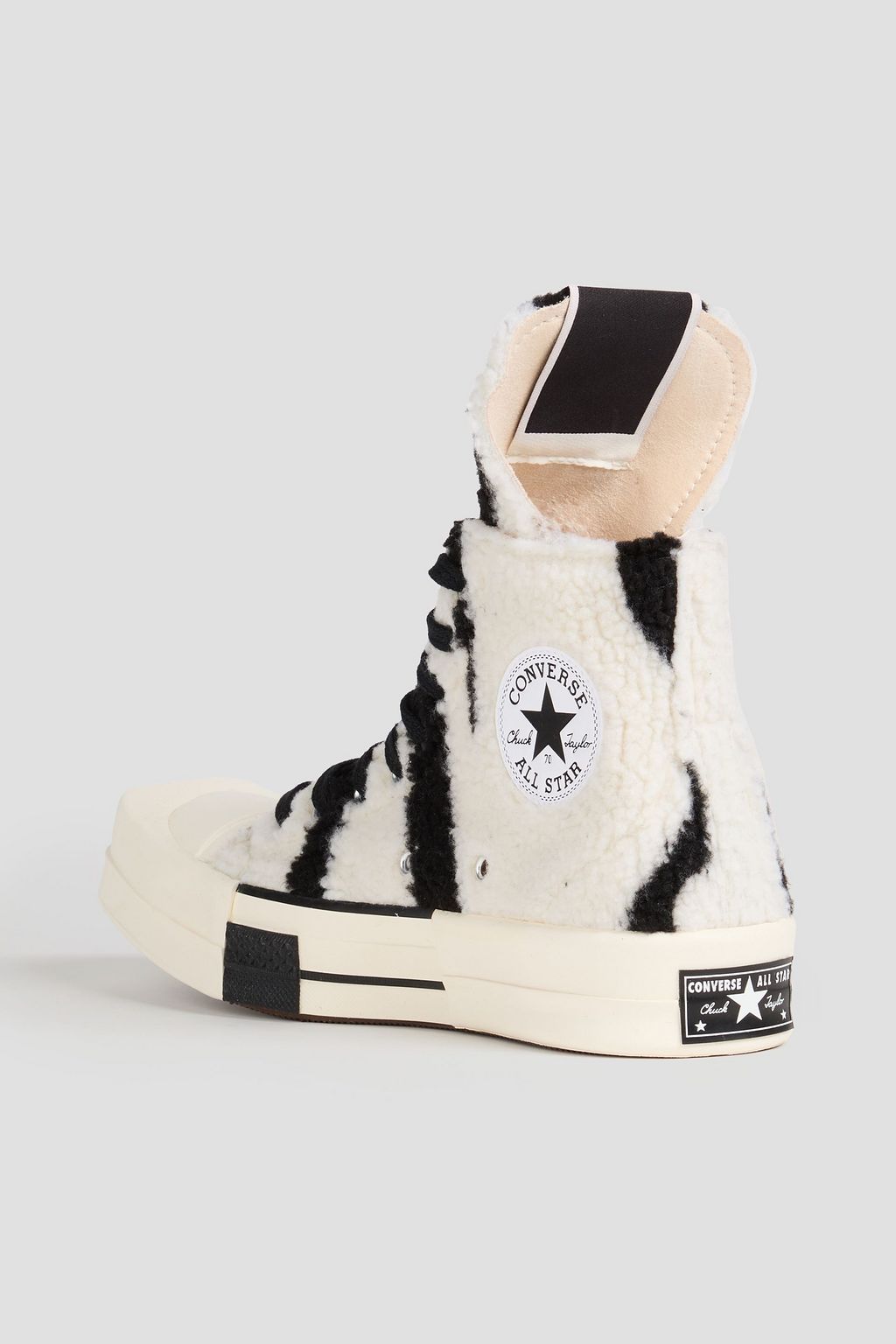 CONVERSE X DRKSHDW حذاء سنيكرز "توربدارك" بطول فوق الكاحل من الفرو الصناعي وبطبعة جلد الحمار الوحشي