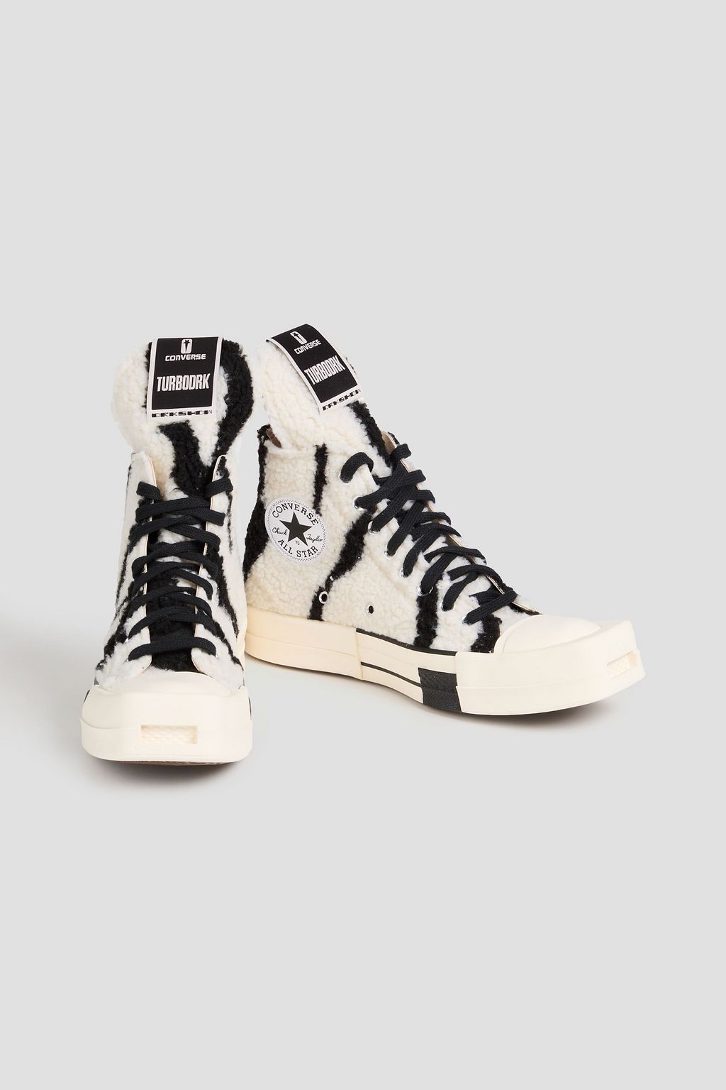 CONVERSE X DRKSHDW حذاء سنيكرز "توربدارك" بطول فوق الكاحل من الفرو الصناعي وبطبعة جلد الحمار الوحشي