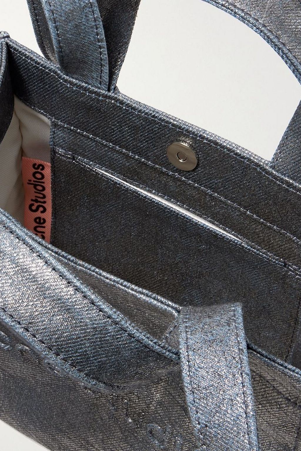 ACNE STUDIOS Embossed distressed metallic denim tote