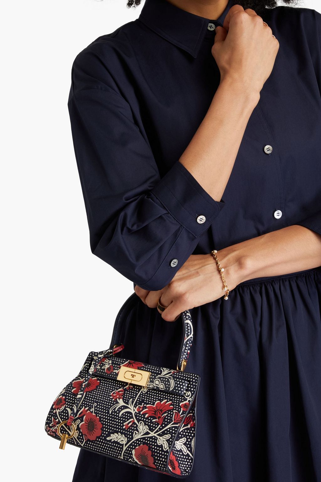 TORY BURCH حقيبة توت "لي" من الشامواه المطلي بطبعة الأزهار
