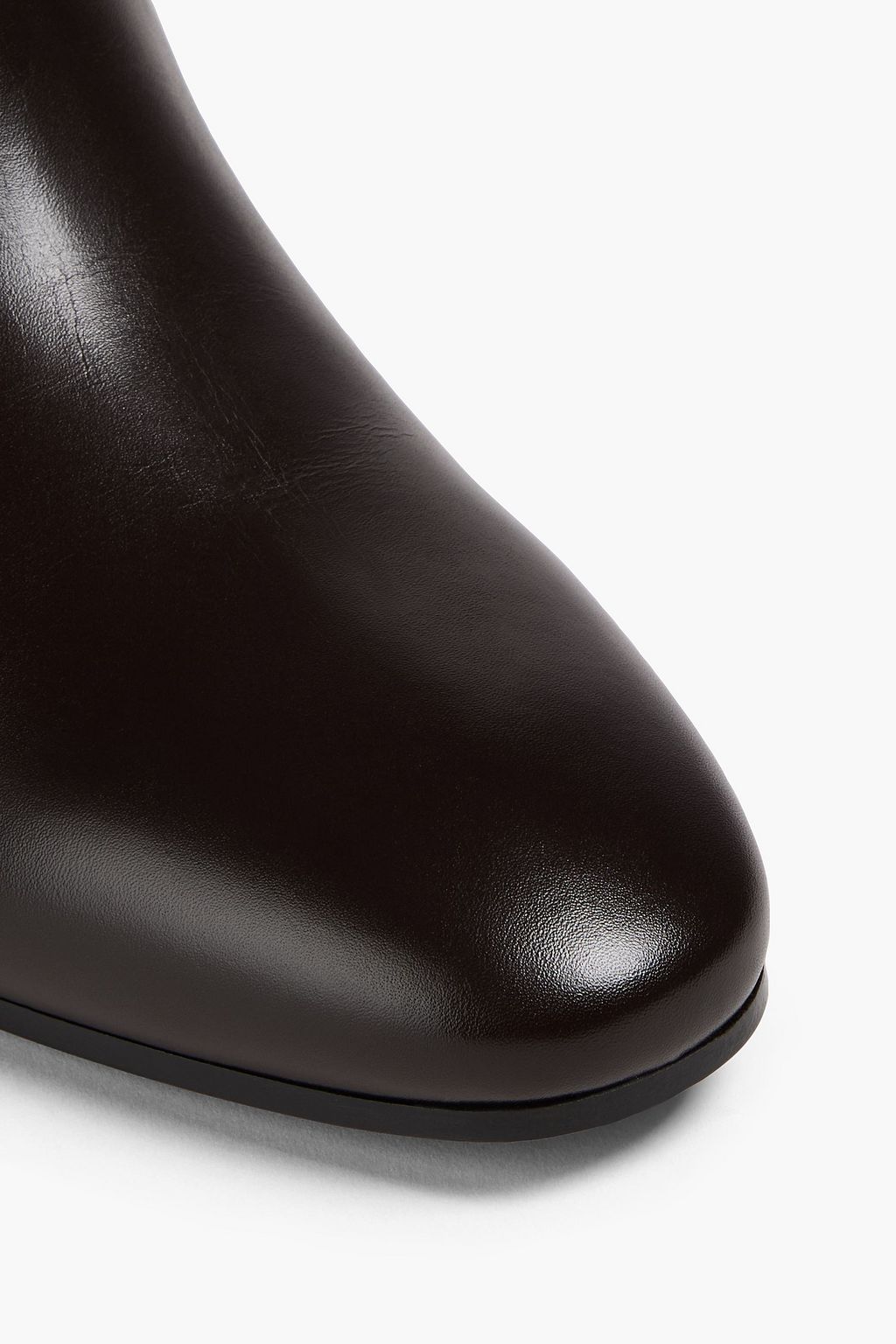 ALAÏA Ziggy laser-cut leather ankle boots