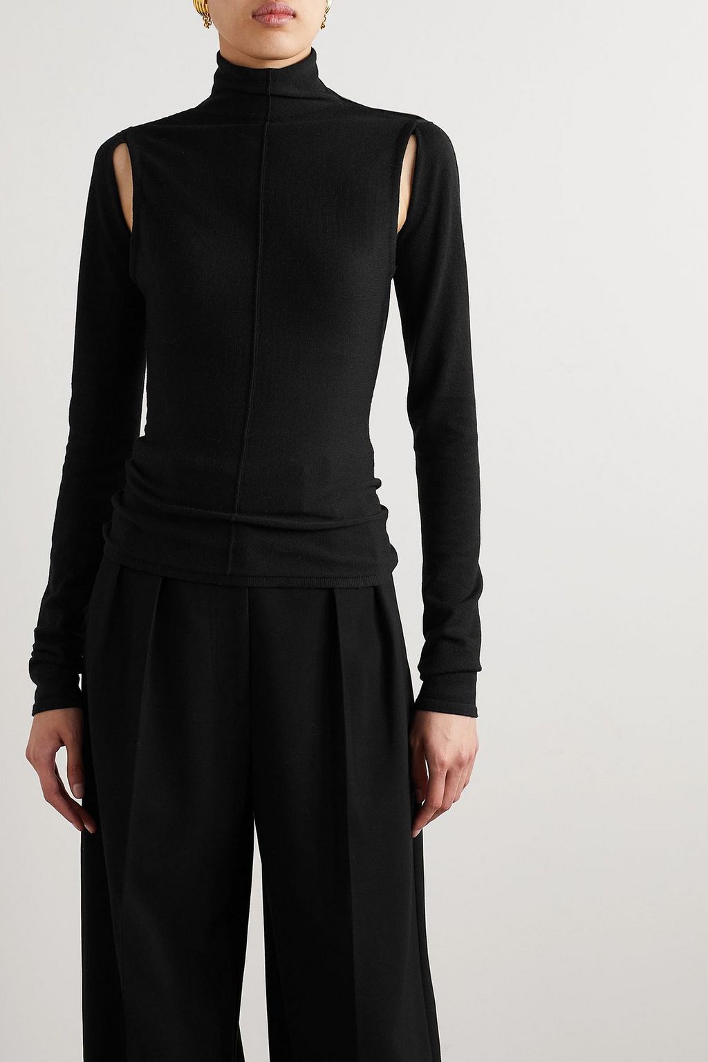 KHAITE Marlowe cutout wool turtleneck top