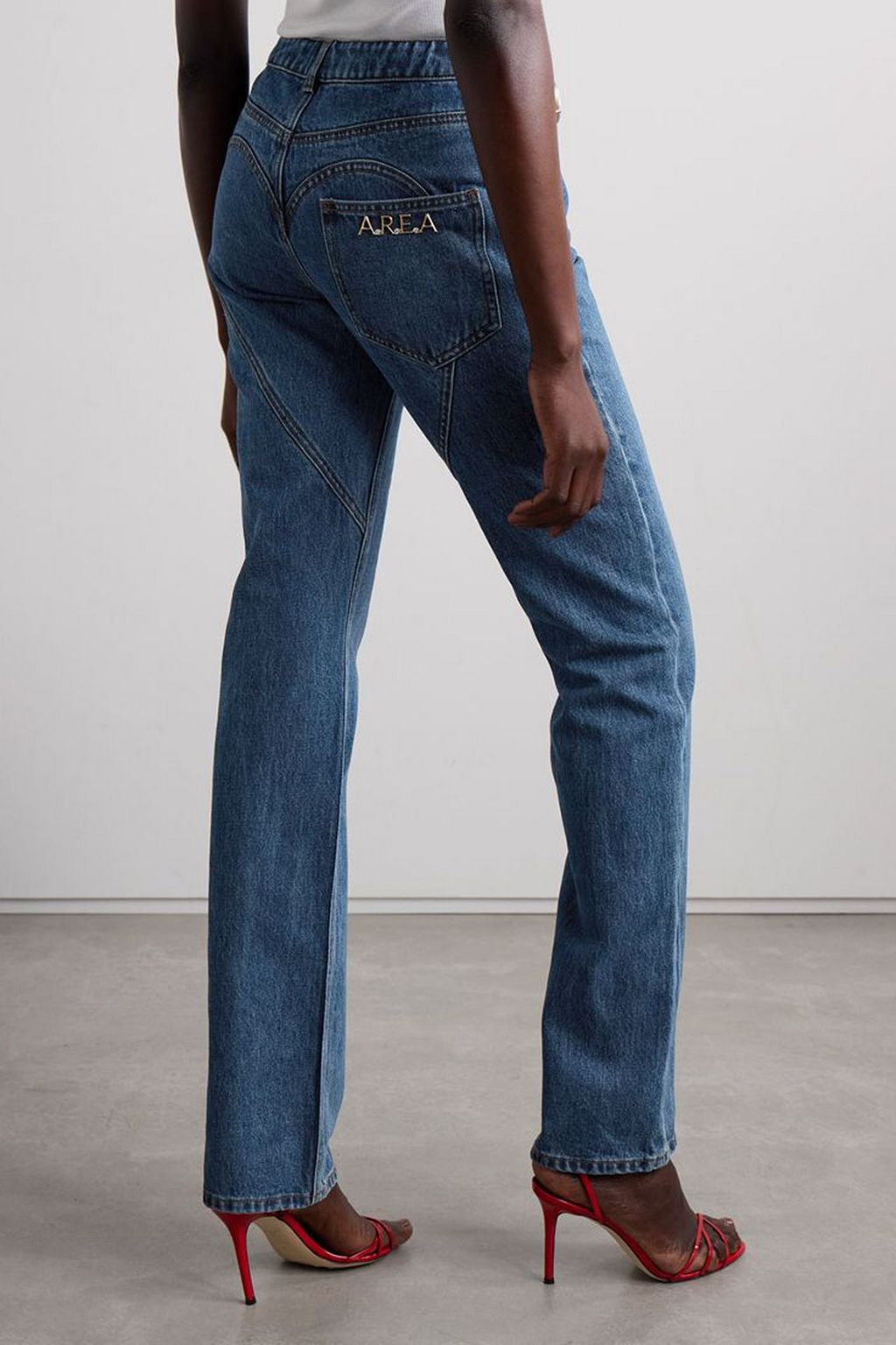 AREA Hoch sitzende Jeans mit schmalem Bein und Verzierung