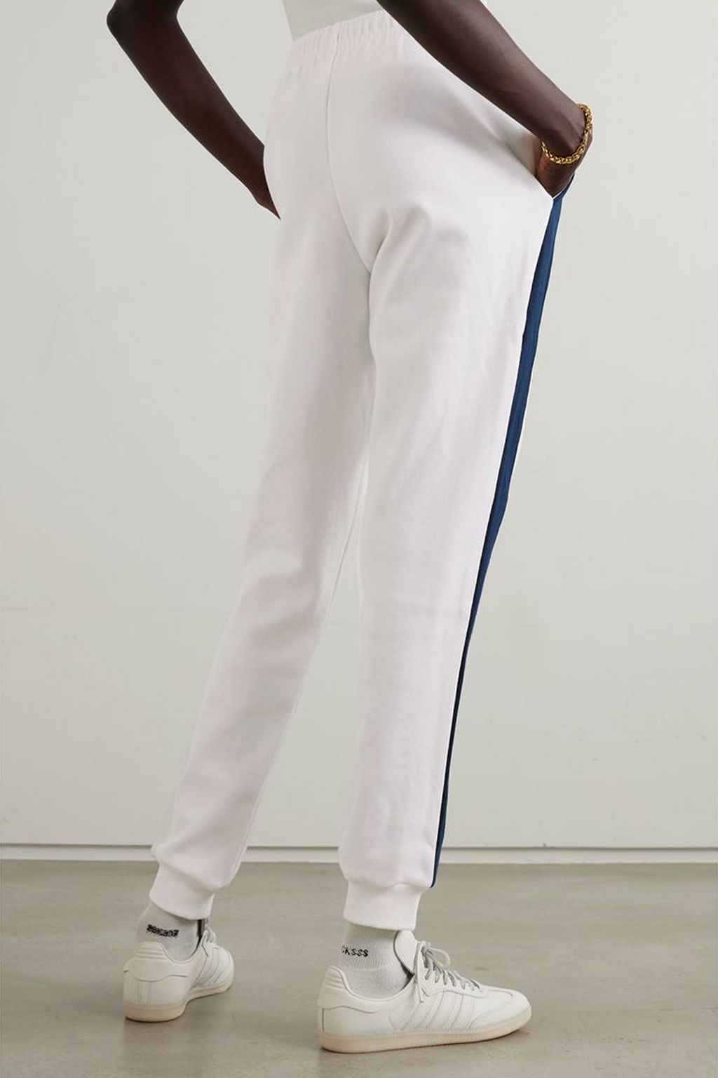 LACOSTE X SPORTY & RICH بنطال رياضي مُخطّط من مزيجٍ من القطن البيكيه