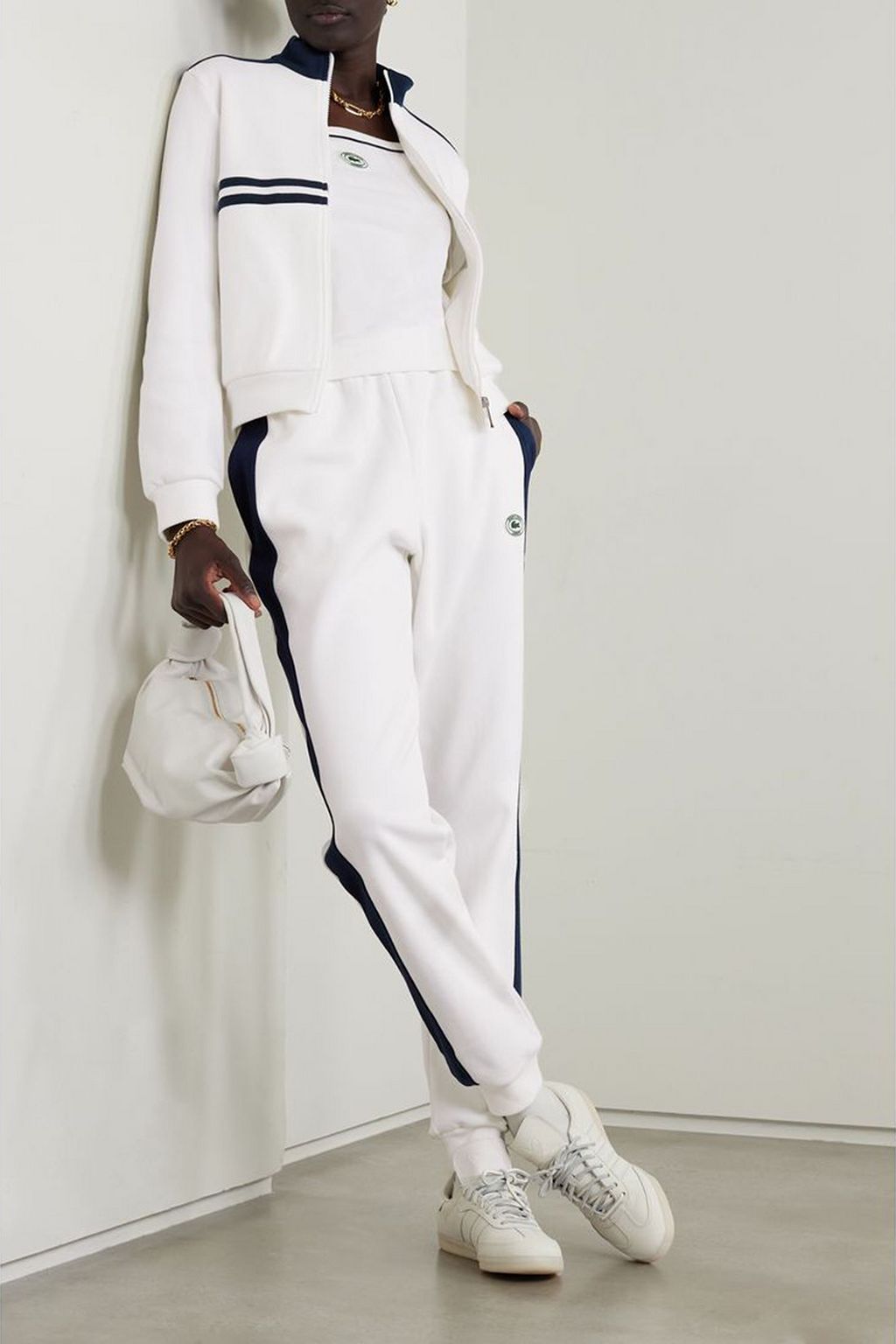 LACOSTE X SPORTY & RICH بنطال رياضي مُخطّط من مزيجٍ من القطن البيكيه