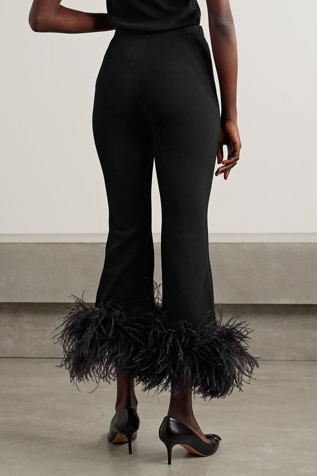 VALENTINO GARAVANI Cropped feather-trimmed knitted flared pants