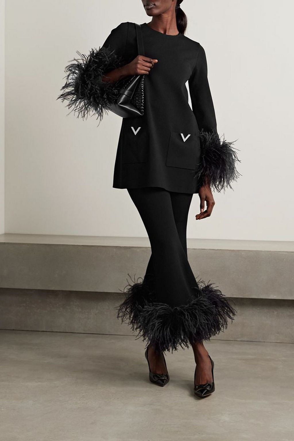 VALENTINO GARAVANI Cropped feather-trimmed knitted flared pants