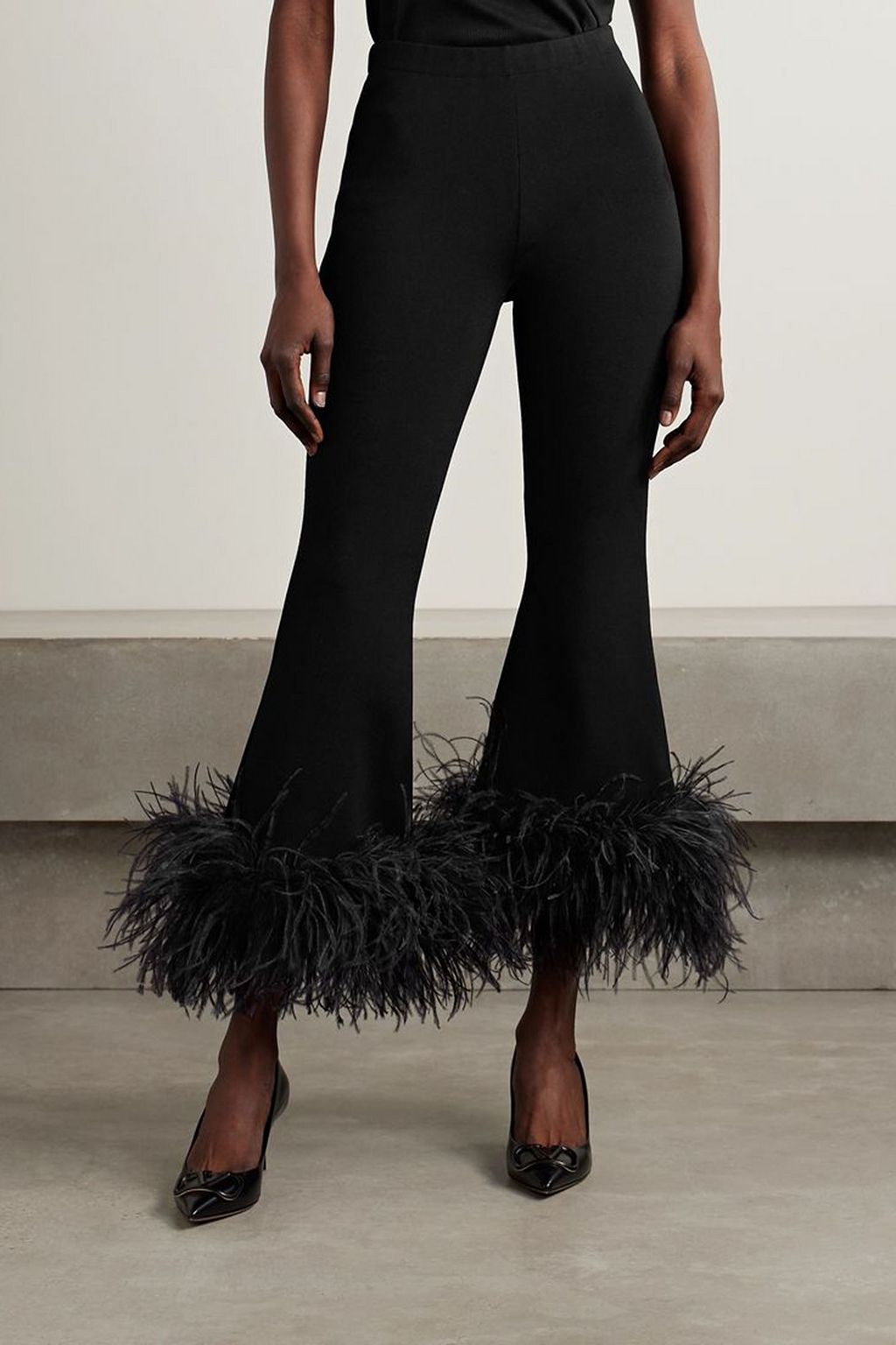 VALENTINO GARAVANI Cropped feather-trimmed knitted flared pants