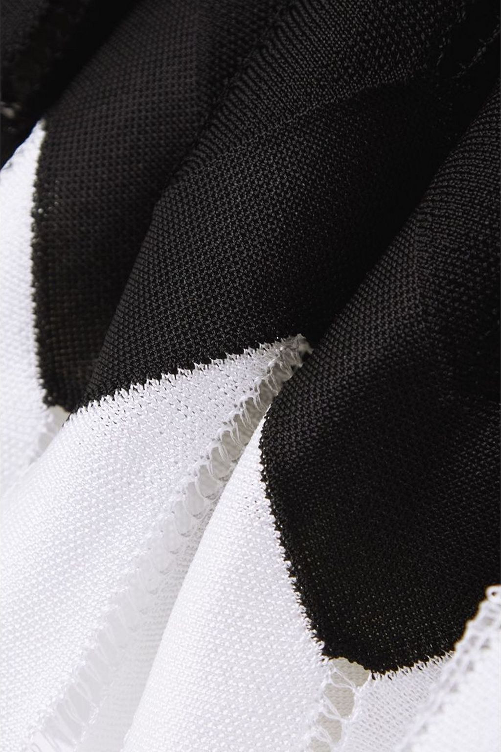ALAÏA Two-tone pleated stretch-knit mini skirt