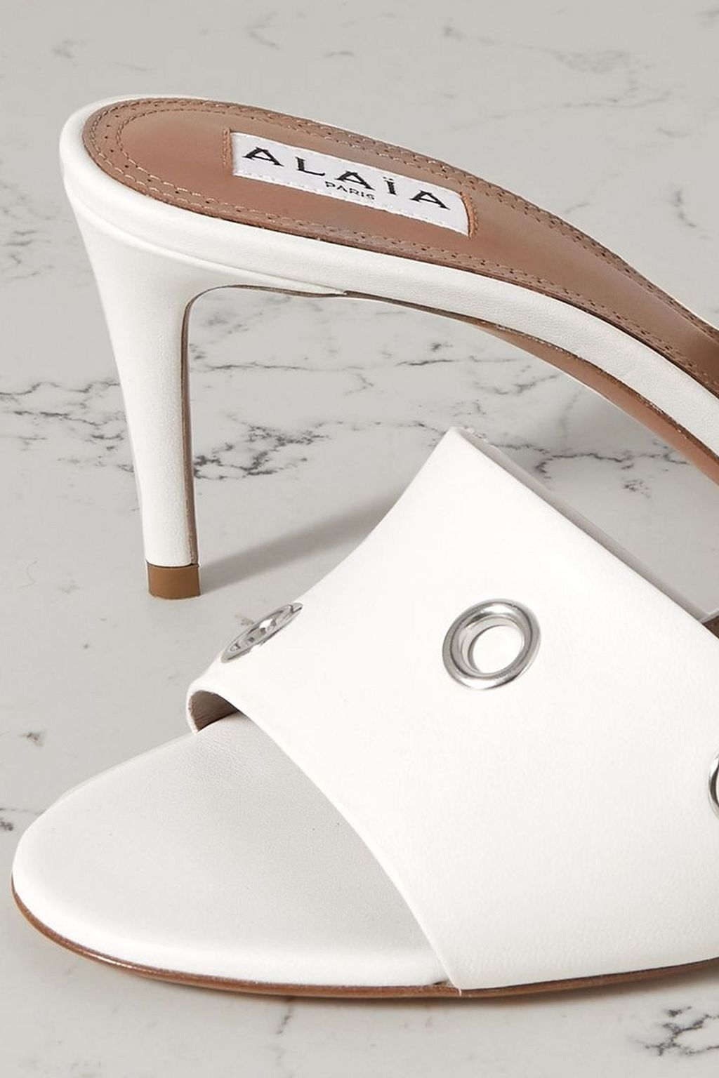 ALAÏA 75 embellished leather mules