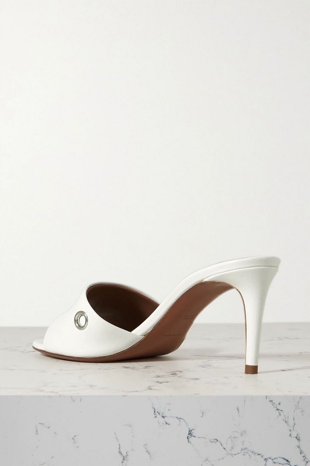 ALAÏA 75 embellished leather mules