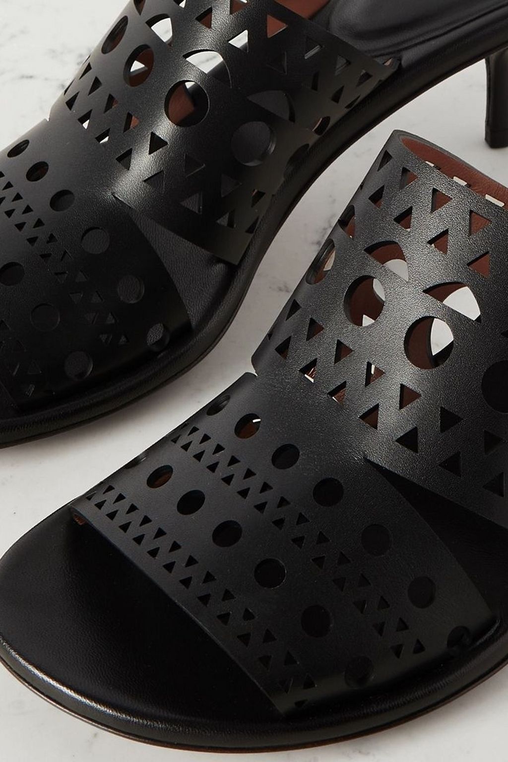 ALAÏA 55 laser-cut leather mules