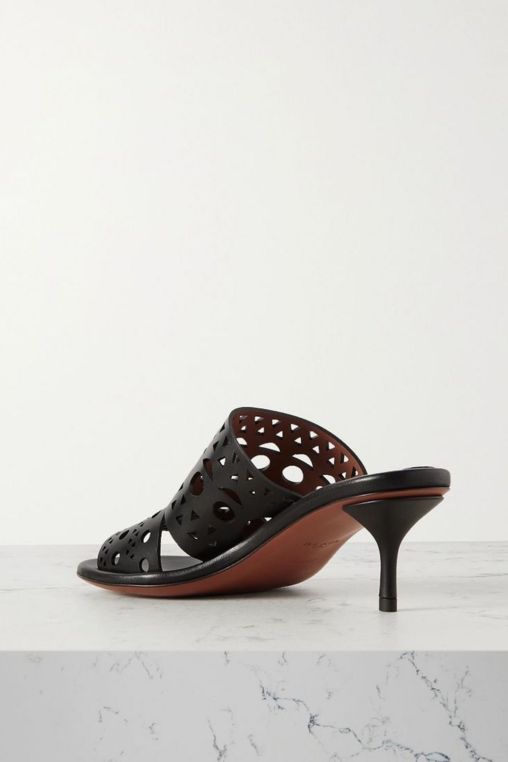 ALAÏA 55 laser-cut leather mules