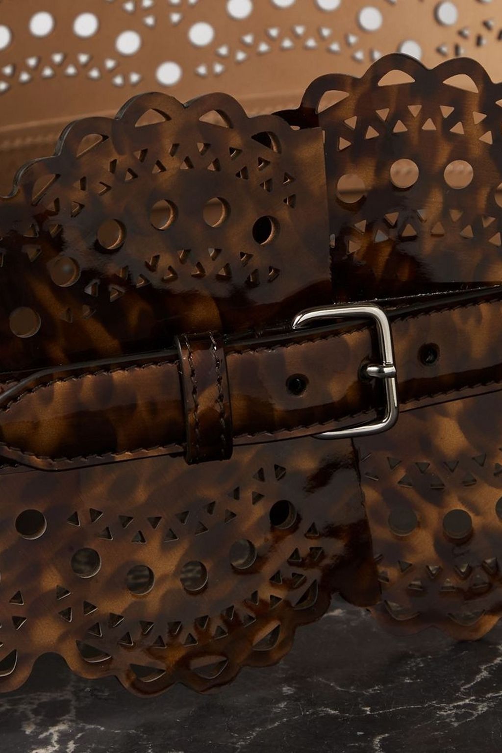 ALAÏA Laser-cut tortoiseshell leather waist belt