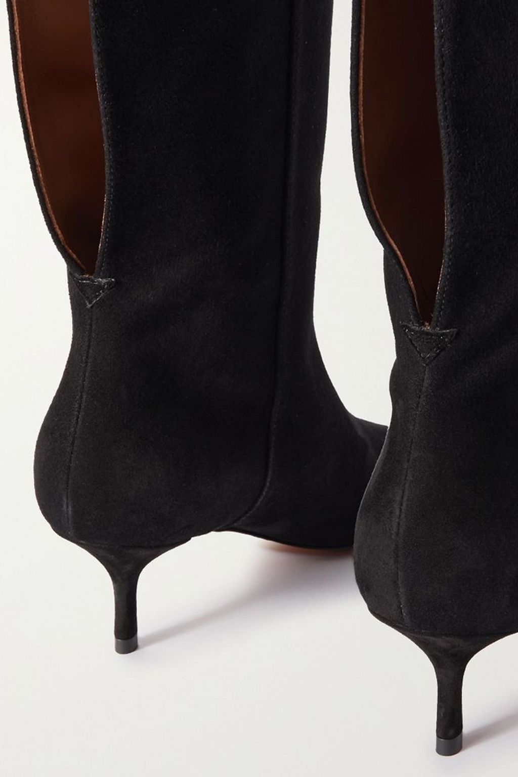 ALAÏA 55 cutout suede knee boots